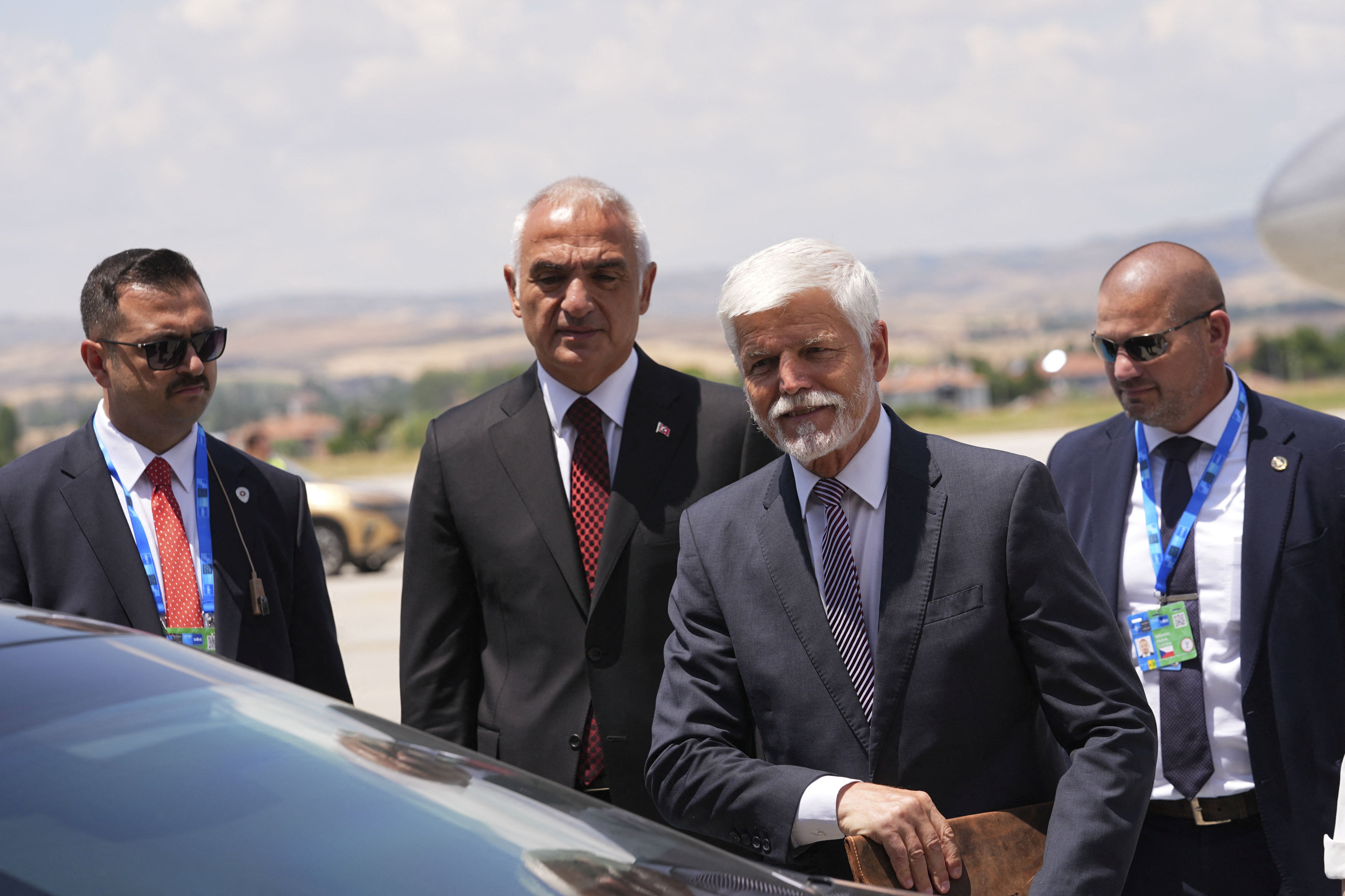 Czech president Petr Pavel is welcomed by the Turkish minister of Culture and Tourism Mehmet Nuri Ersoy at Esenboga Airport in Ankara (Reuters)