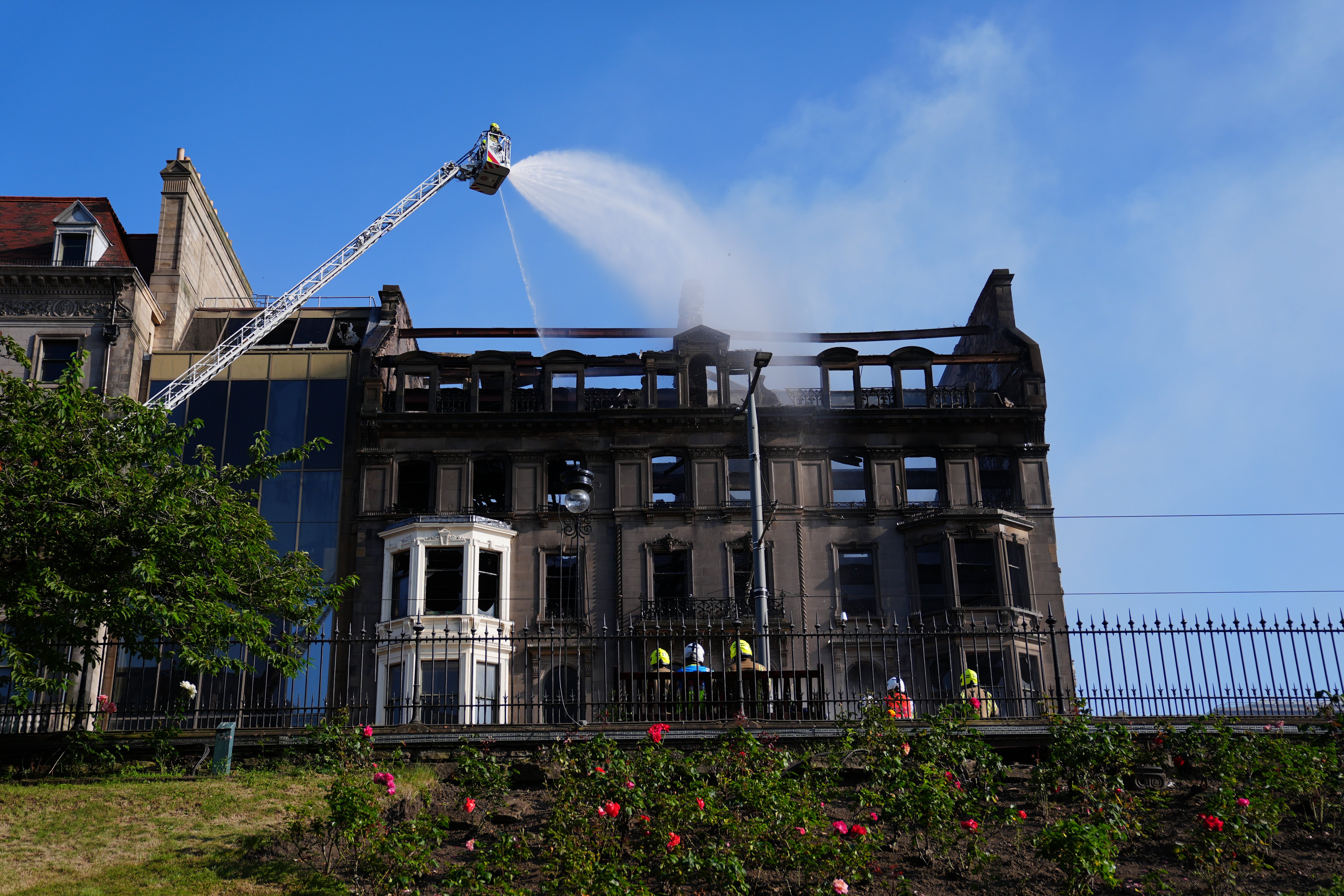 Firefighters at the scene of a blaze at a building on Princes Street in Edinburgh (PA)