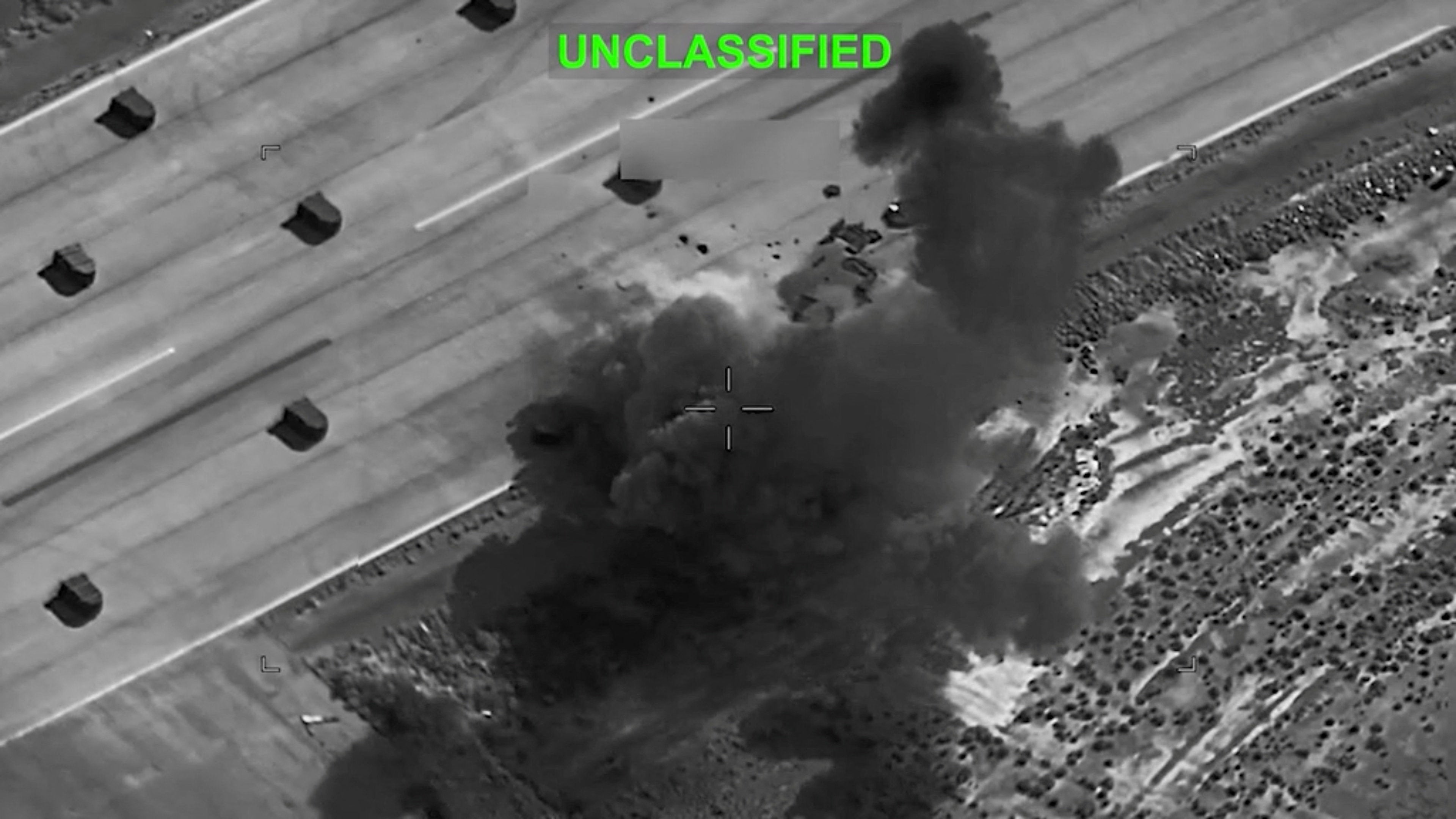 Smoke rises from explosions at an unknown location, following what U.S. Central Command (CENTCOM) said were strikes on Iranian military targets, in this screen grab from a video released on July 8