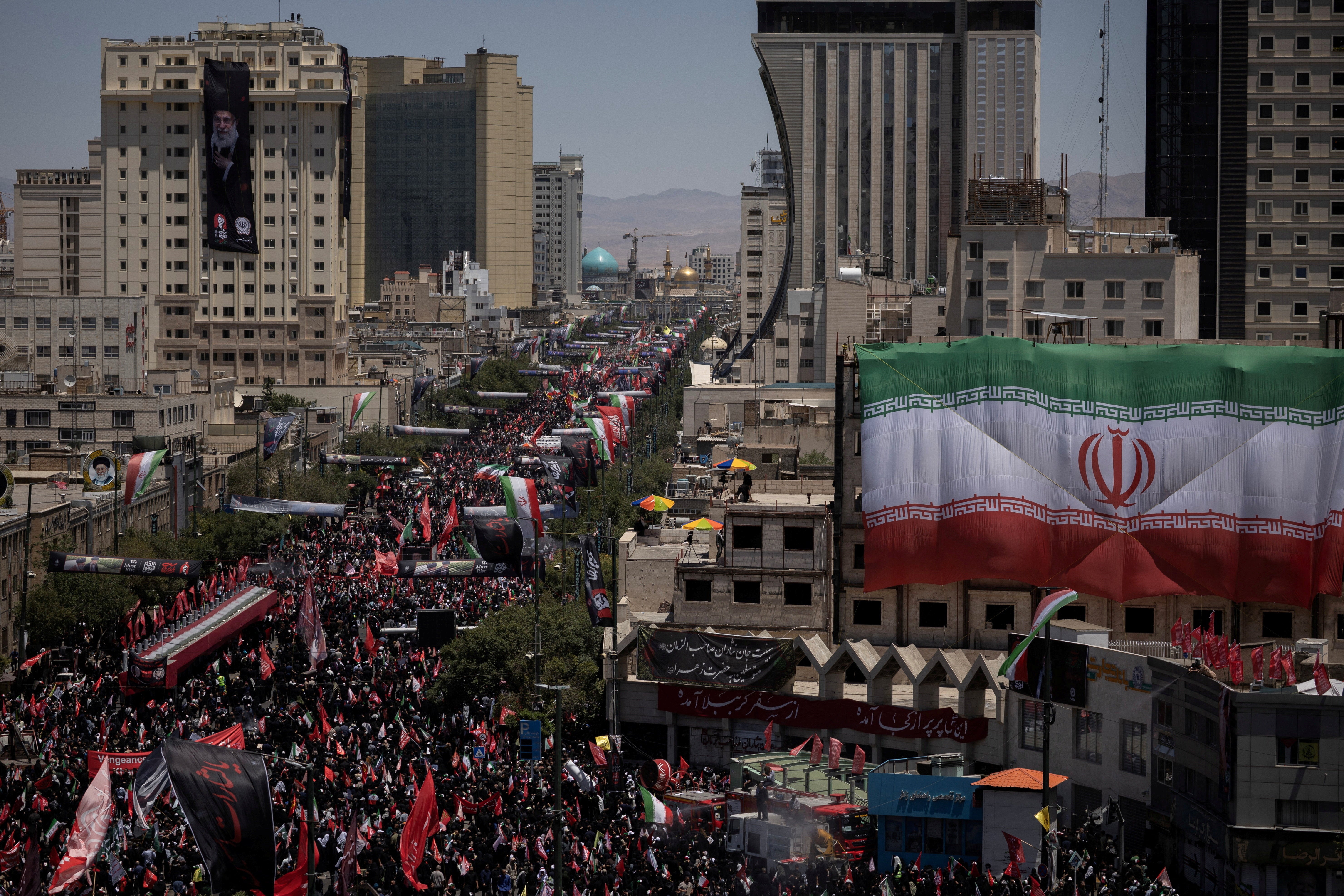 Mourners attend a funeral procession on the day of the burial of Iran's late Supreme Leader Ayatollah Ali Khamenei, who was killed on February 28 in Israeli and U.S. airstrikes, in Mashhad, Iran, July 9, 2026