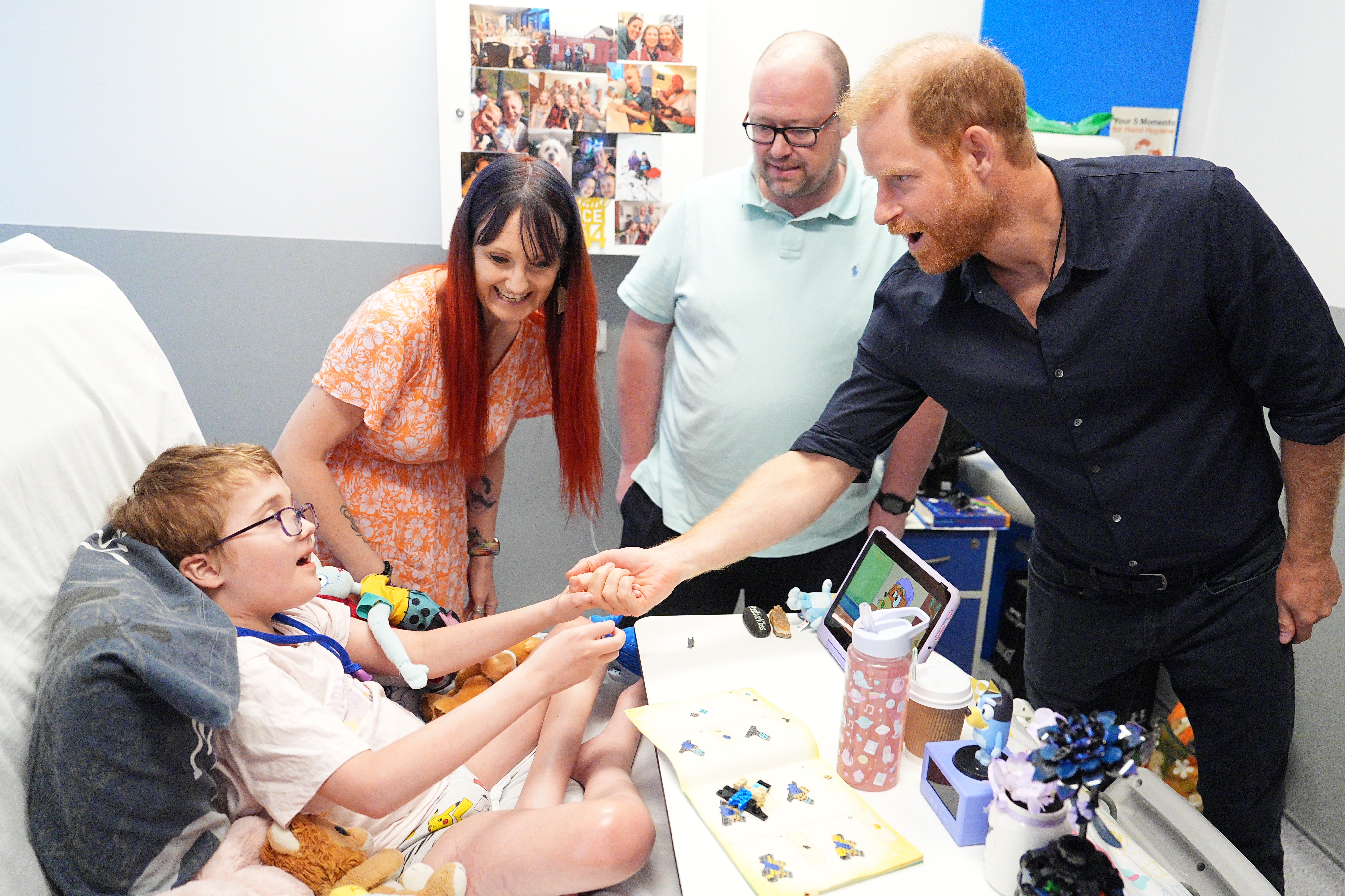 Harry meets Alec Hill, 12, and his parents at Birmingham Children’s Hospital