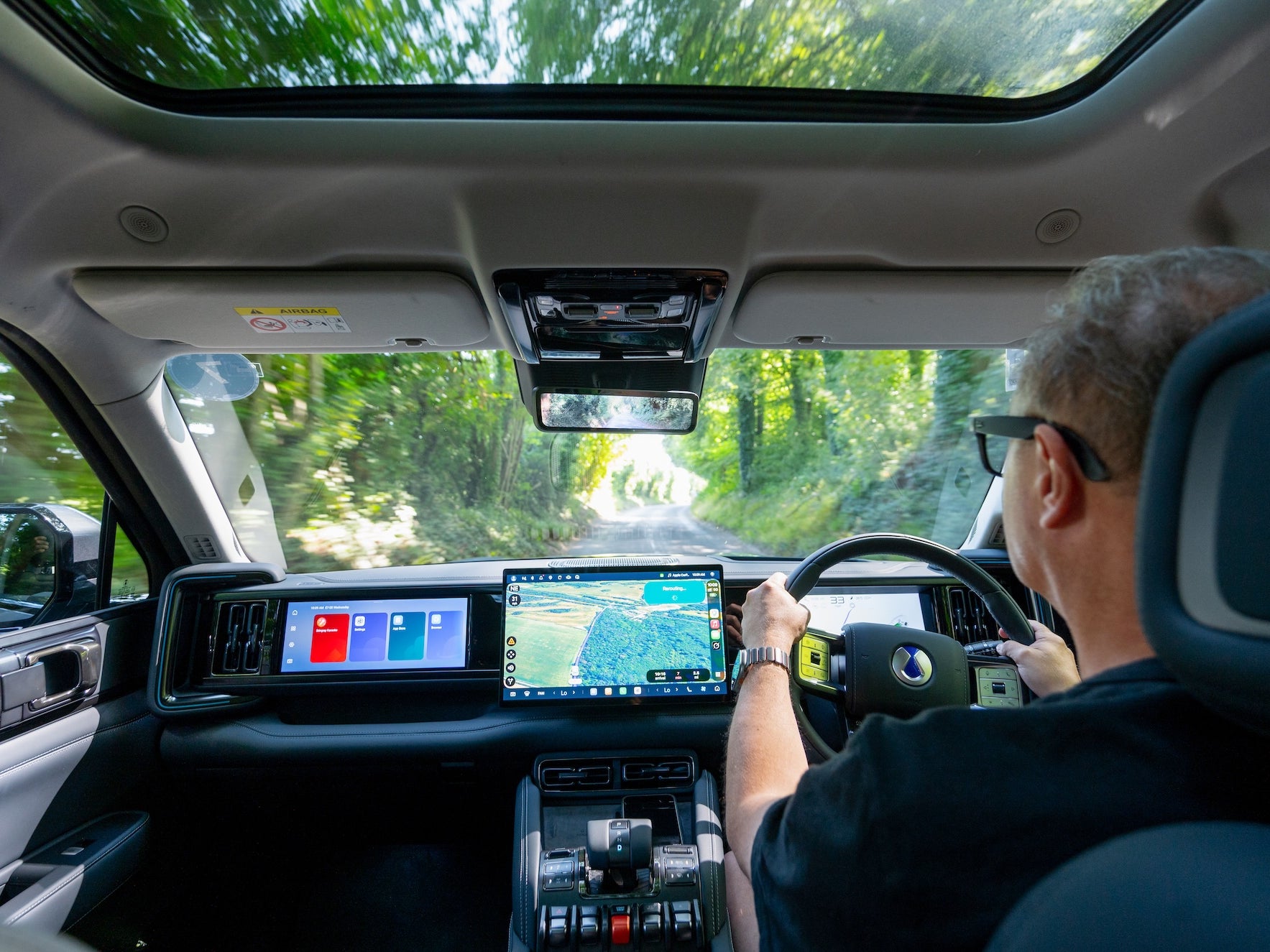 The Denza Bao 5 features up to 4 displays, including a large head-up display in the windscreen (Denza)