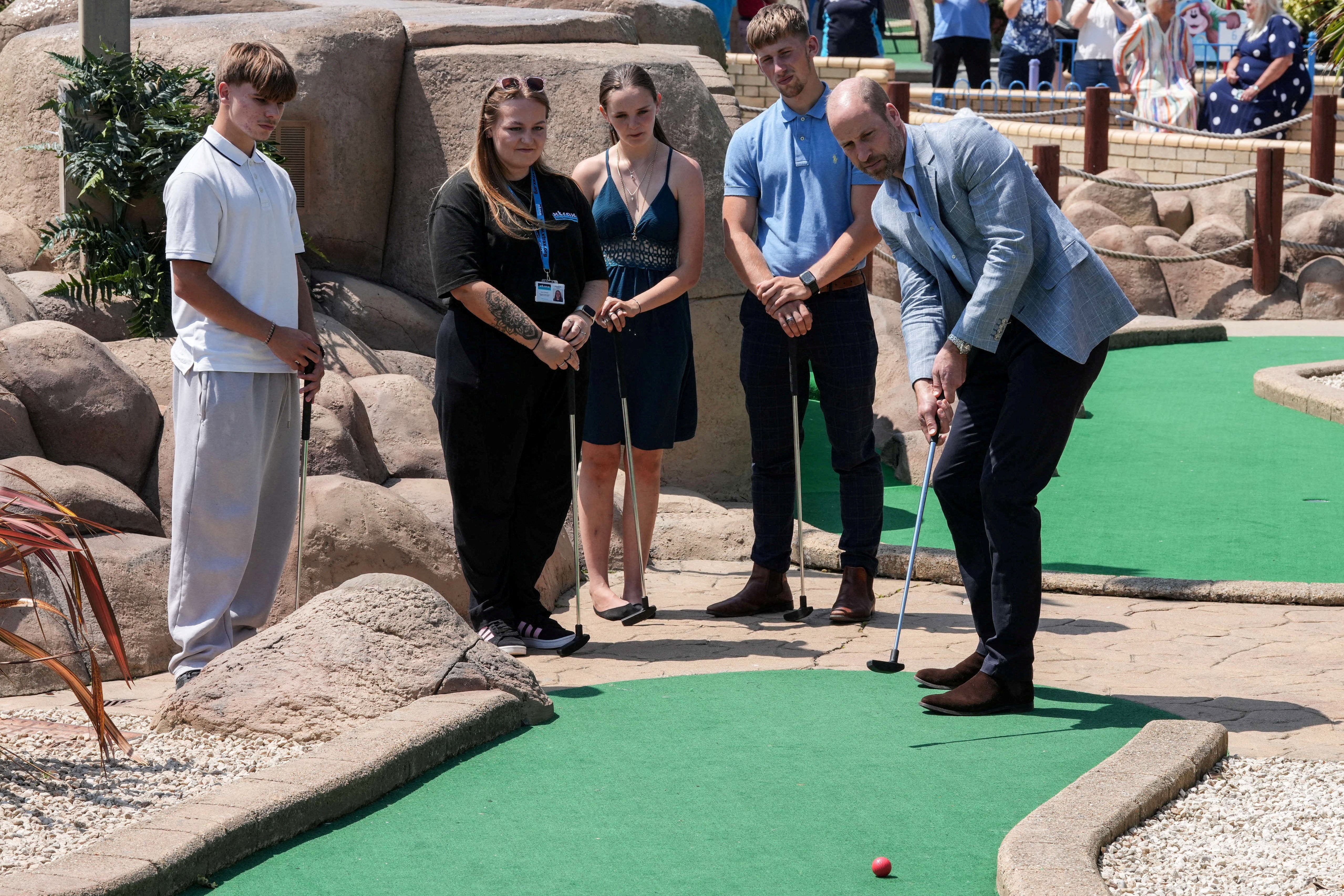 William tested his putting skills at Hastings Adventure Miniature Golf, where the World Crazy Golf Championships 2026 took place last month (Reuters)