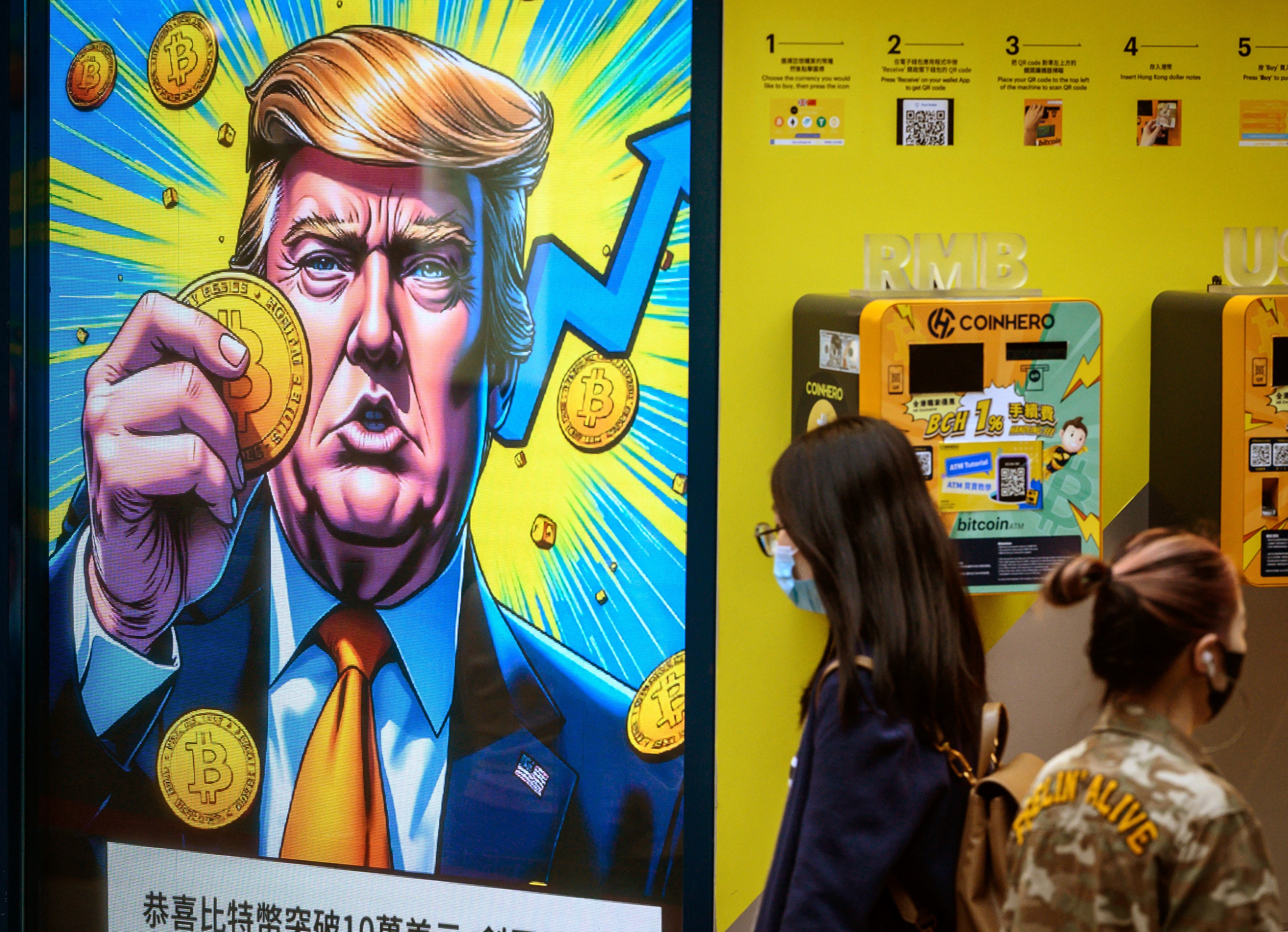 A crypto exchange office in Hong Kong with a screen featuring US President Donald Trump on March 12, 2025.