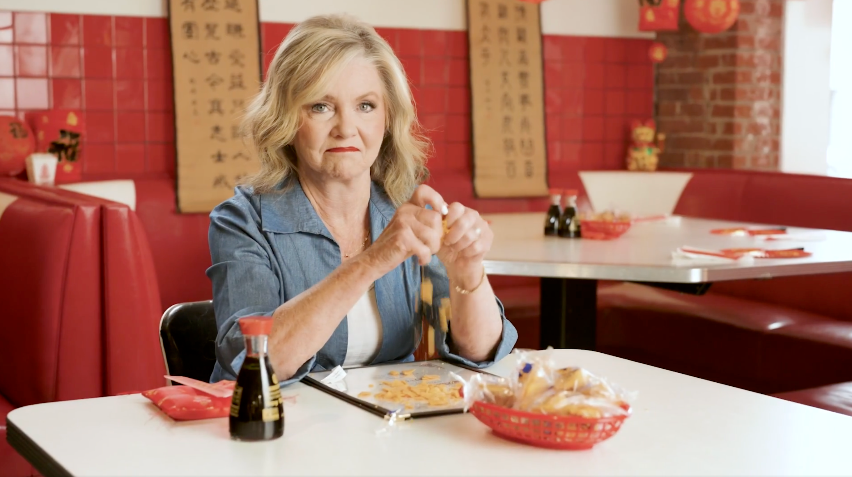 GOP senator crumbles fortune cookies during bizarre campaign video promising to &lsquo;stop Communist China&rsquo;