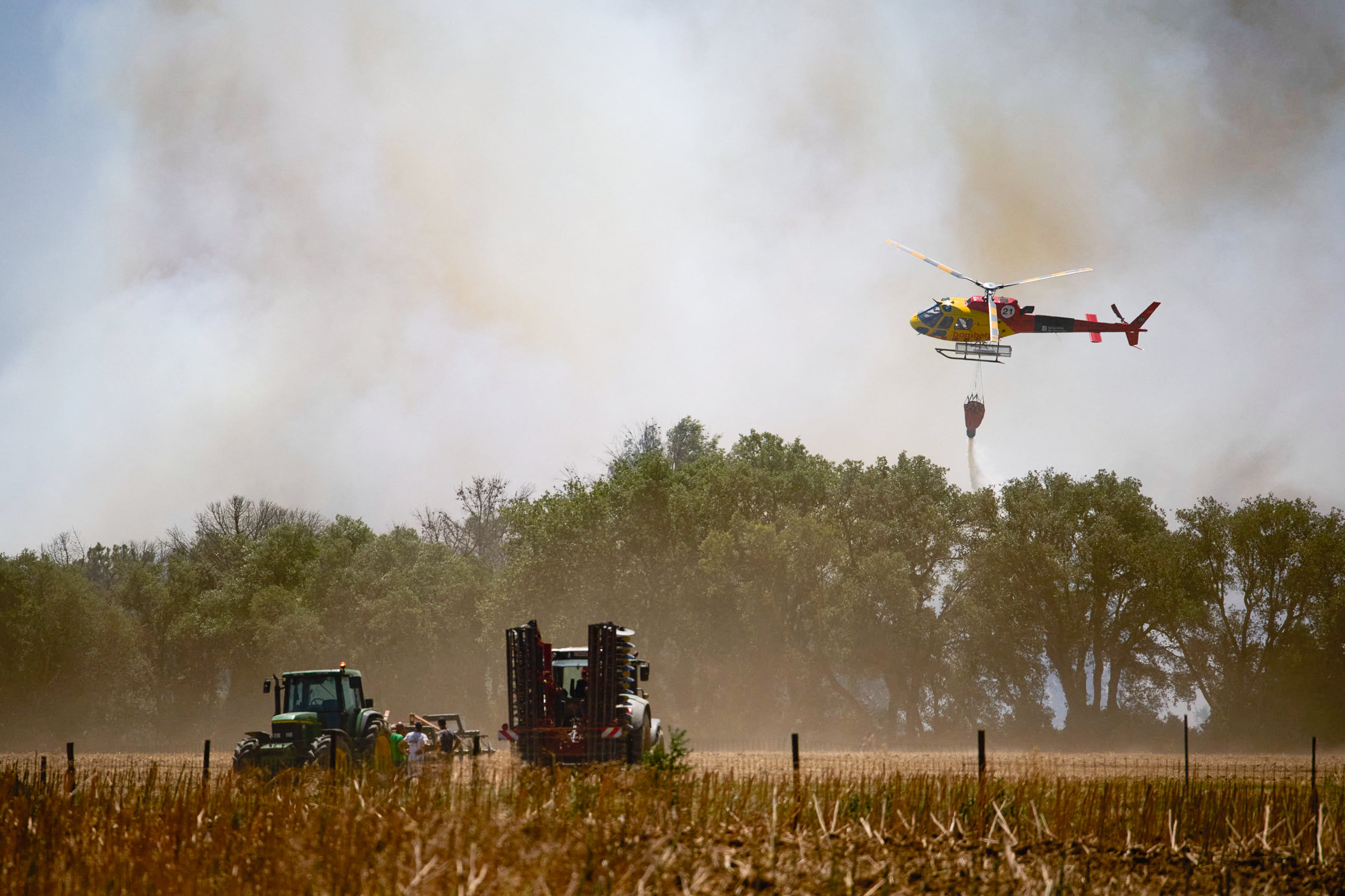 At least 12 people dead as wildfires spread through southern Spain – UK Times