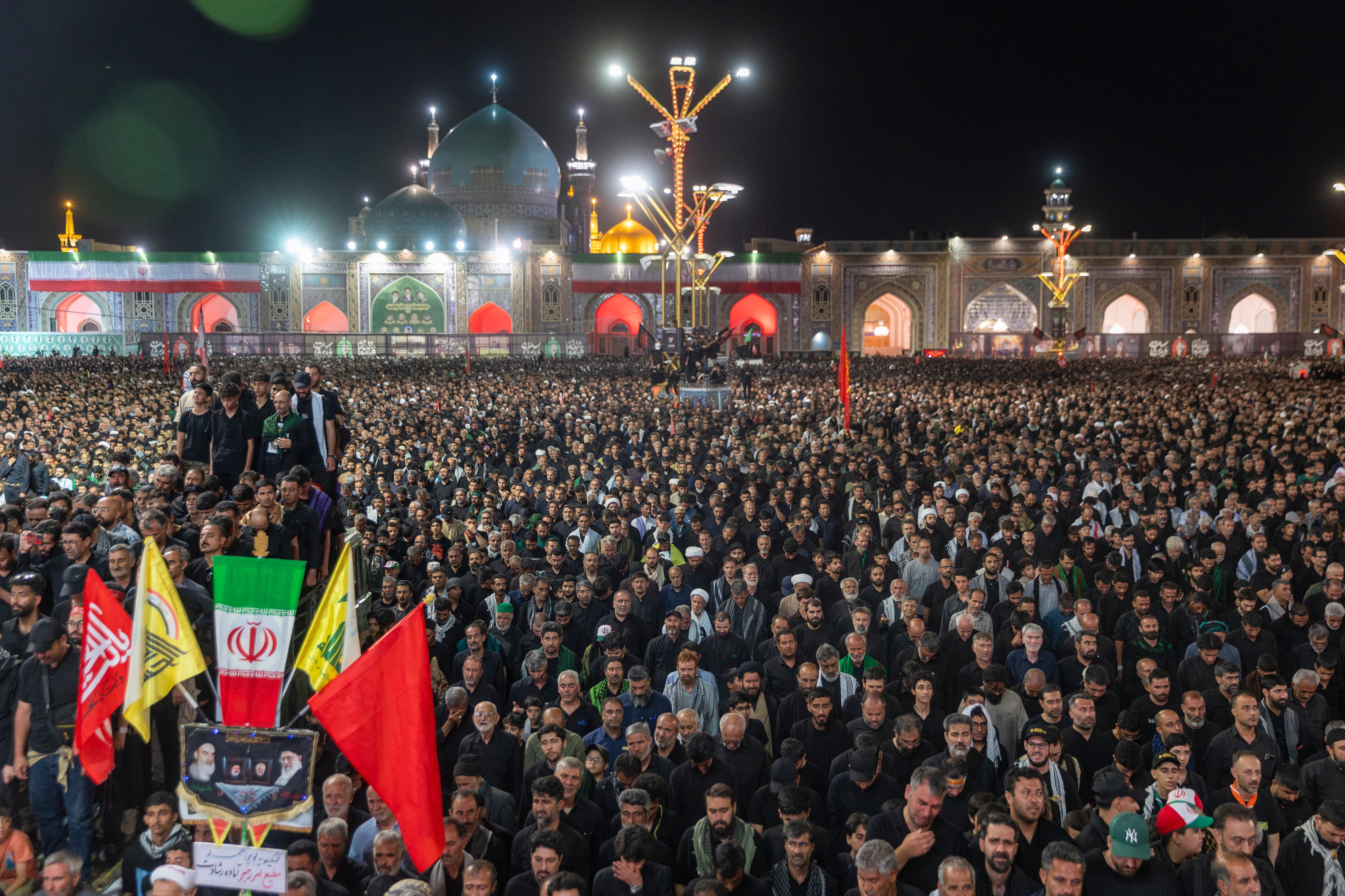 Huge crowds gather for the burial of Iran's late supreme leader, Ayatollah Ali Khamenei at the Imam Reza Shrine on July 09, 2026 in Mashhad, Iran