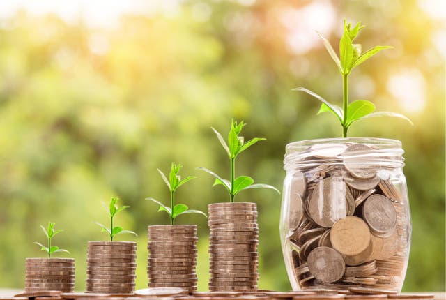 Four piles of growing money (Alamy/PA)