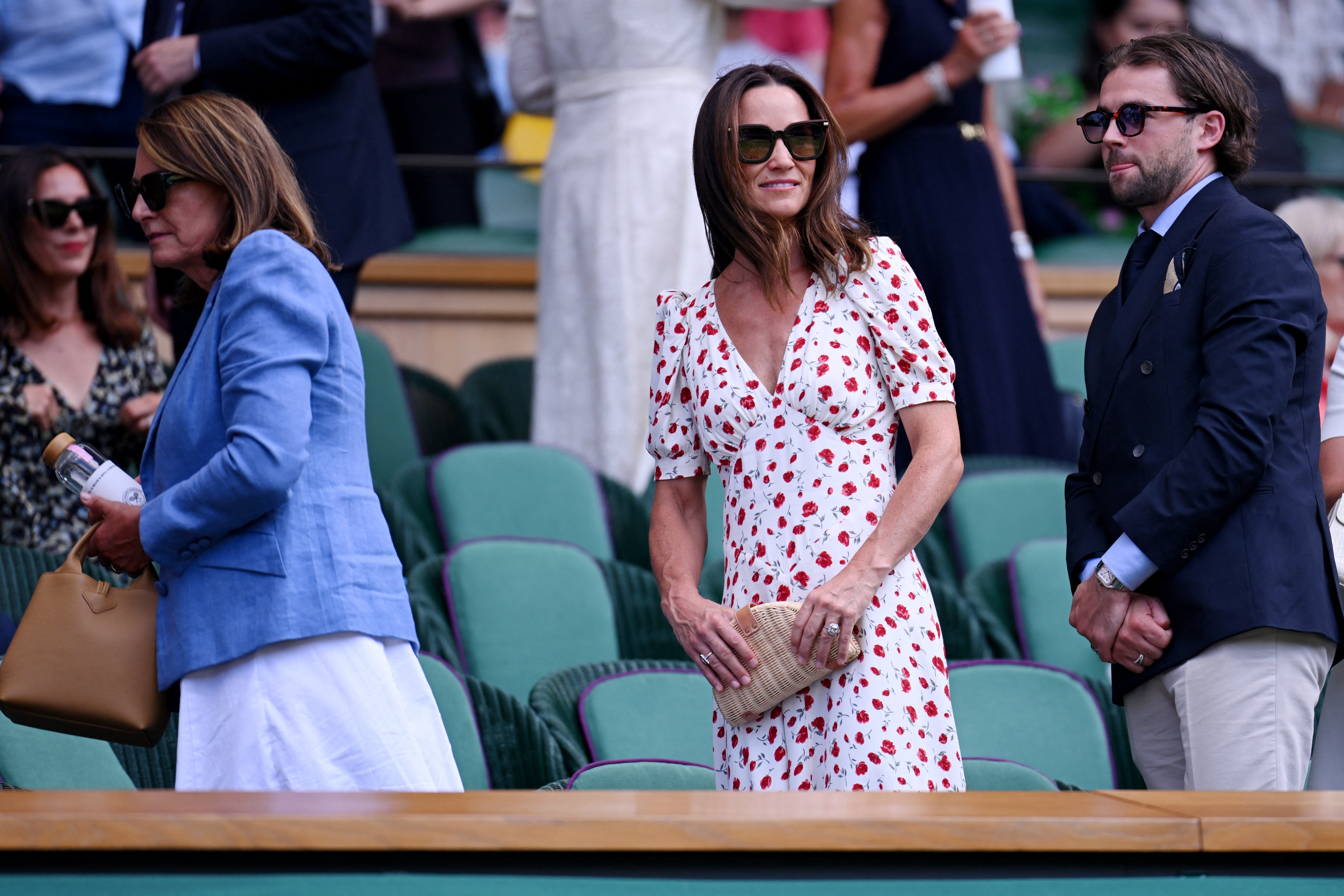 Pippa Middleton in the royal box with her mother Carole Middleton and Luca Rosso (Reuters)