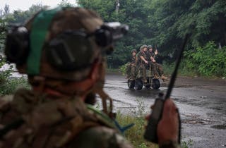 Ukrainian servicemen ride an unmanned ground vehicle (UGV) during their combat mission, amid Russia's attack on Ukraine, in the frontline town of Druzhkivka, in Donetsk region, Ukraine July 9, 2026.