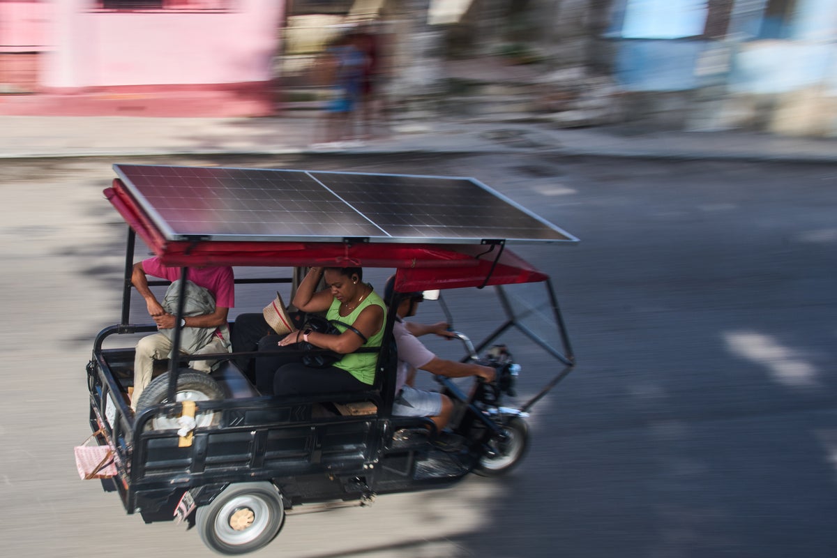 Solar-powered electric tricycles help Cubans cope with fuel shortages and blackouts