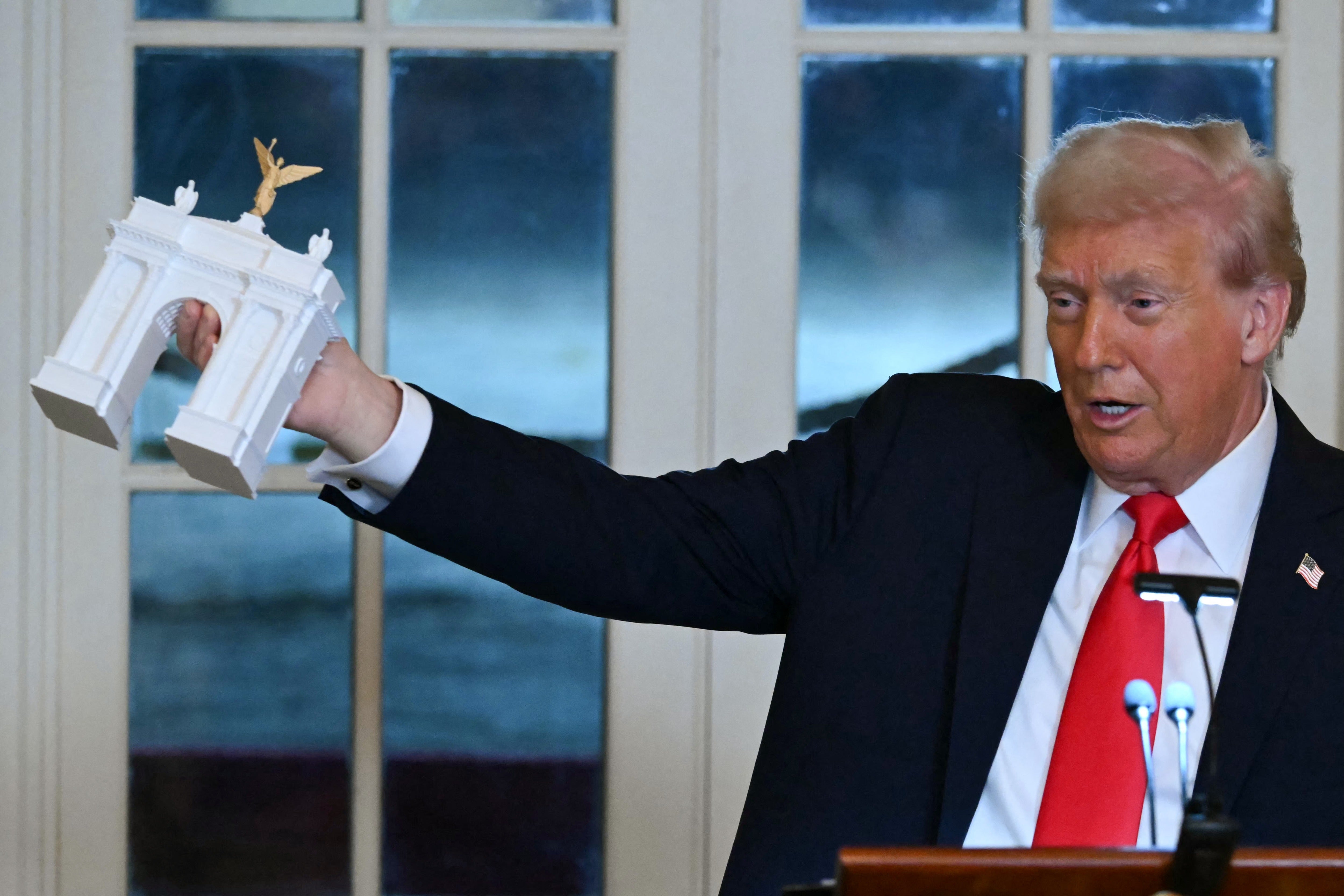 Veterans groups have strongly opposed the president’s arch, arguing it will disrupt the solemnity of nearby Arlington National Cemetry (AFP/Getty)