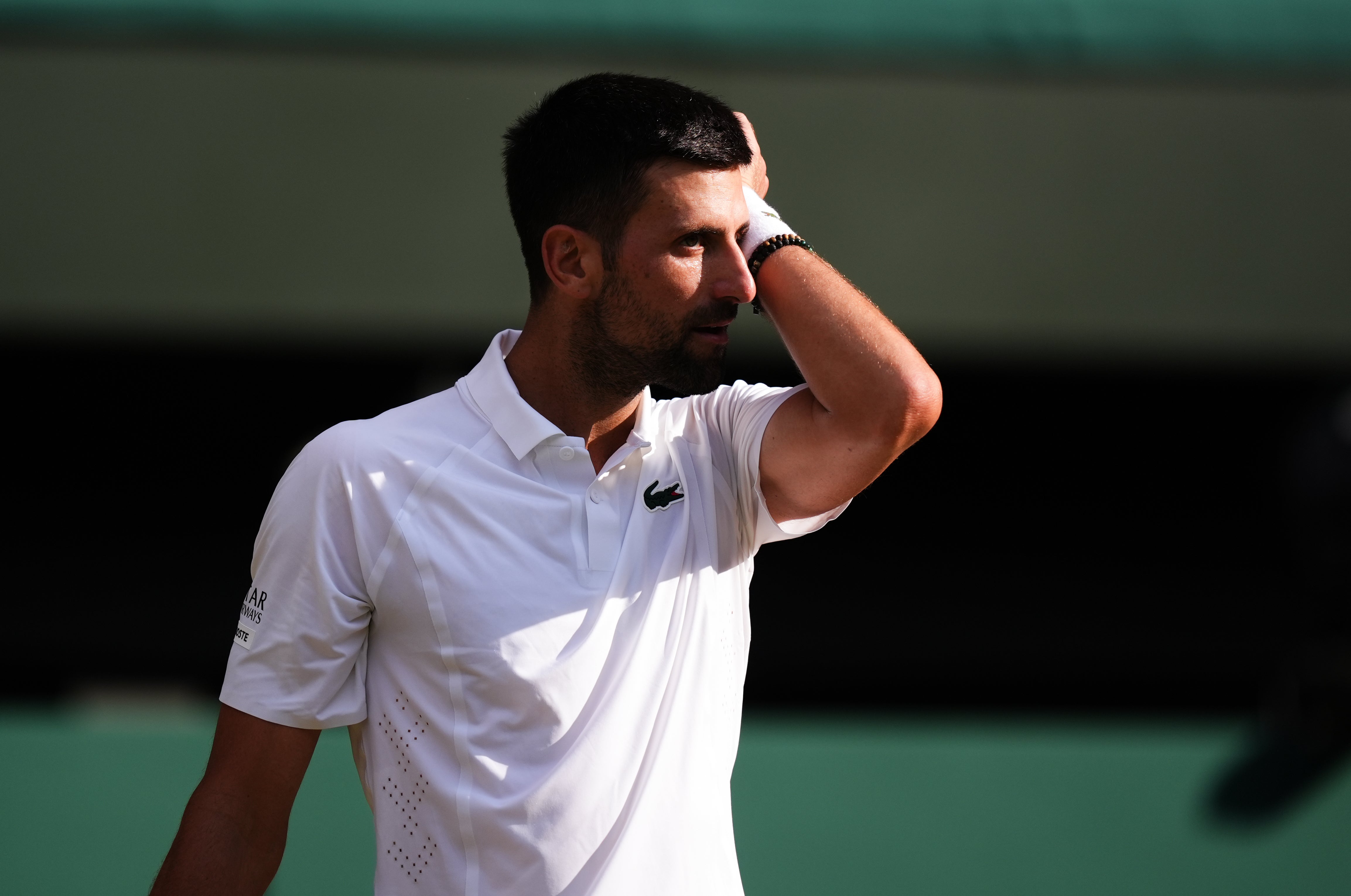 Novak Djokovic feels the heat against Jannik Sinner (Mike Egerton/PA) (PA Wire)