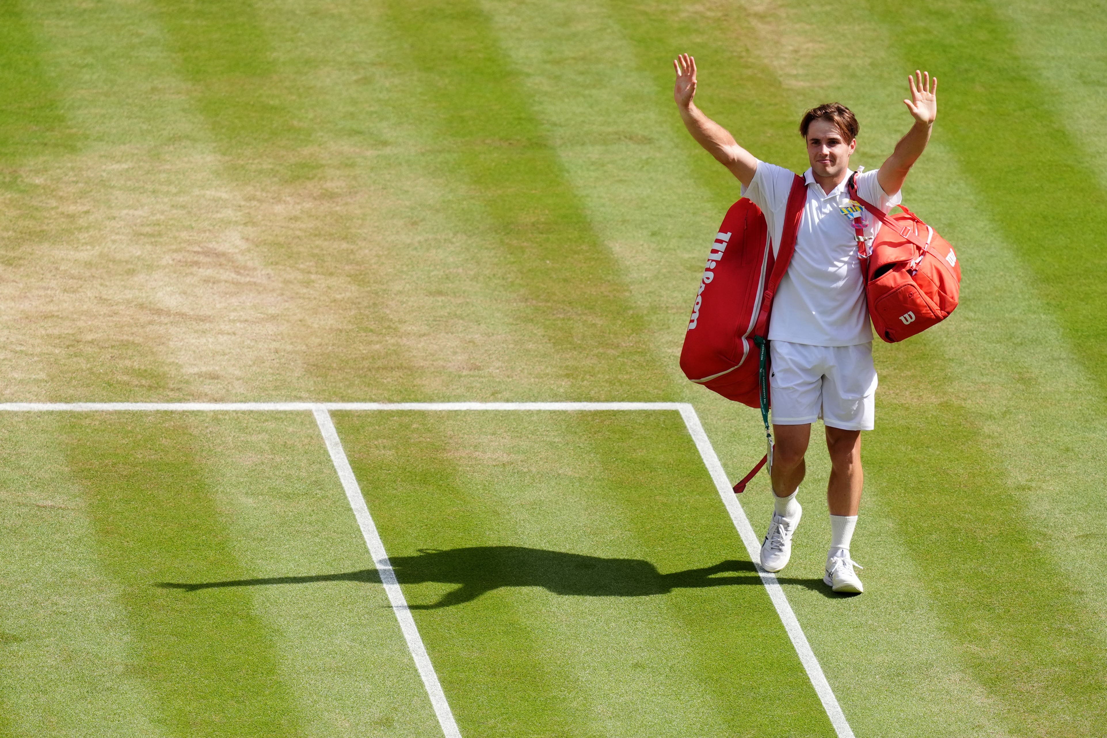 Arthur Fery waves goodbye to Centre Court (John Walton/PA) (PA Wire)