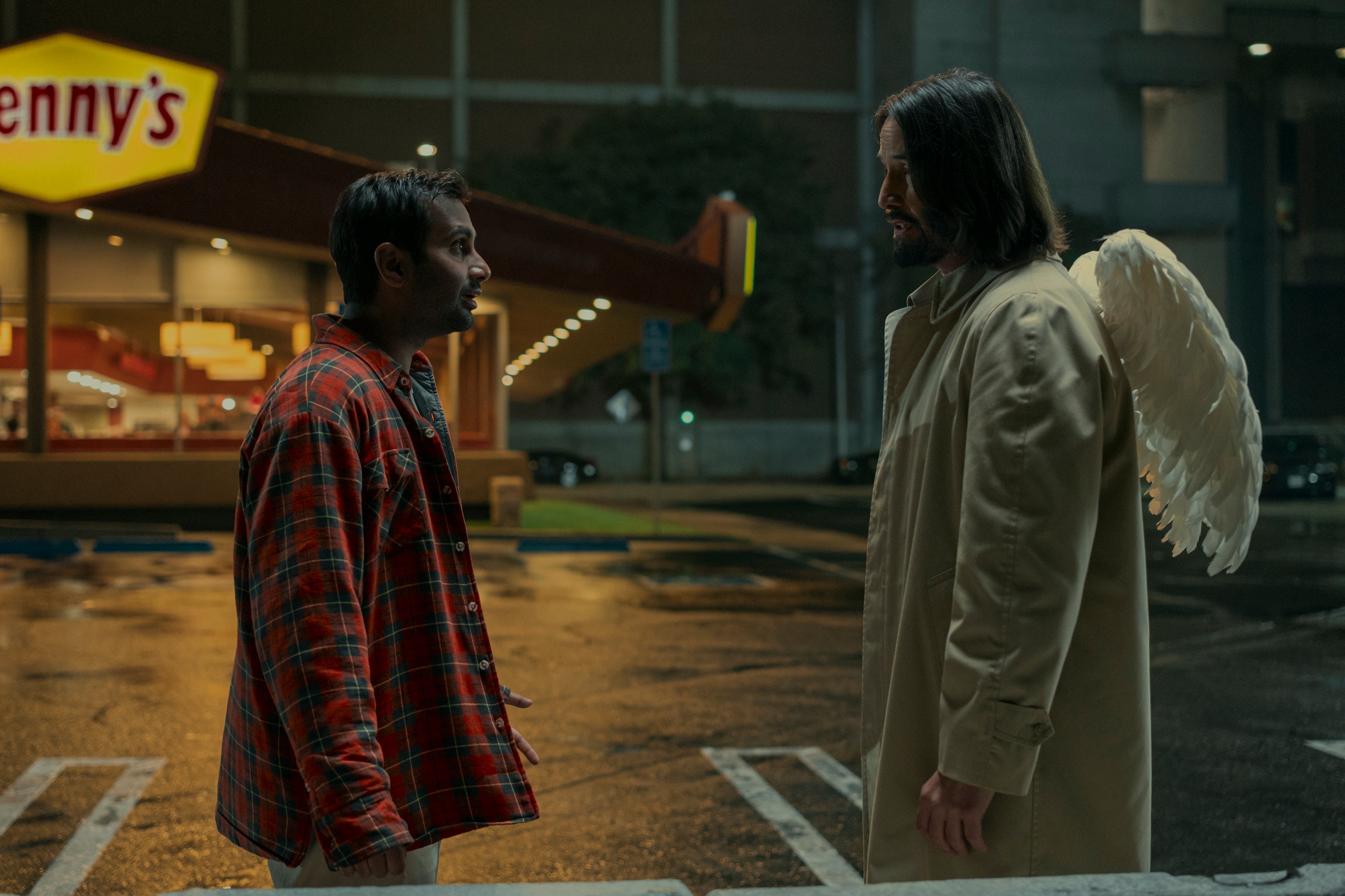 Keanu Reeves, right, appears with Aziz Ansari in a scene from the comedian’s 2025 #MeToo comeback movie, Good Fortune