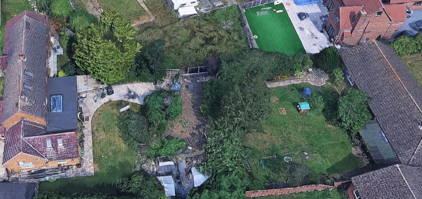 The mostly cleared Leylandii border can be seen in the centre of this image