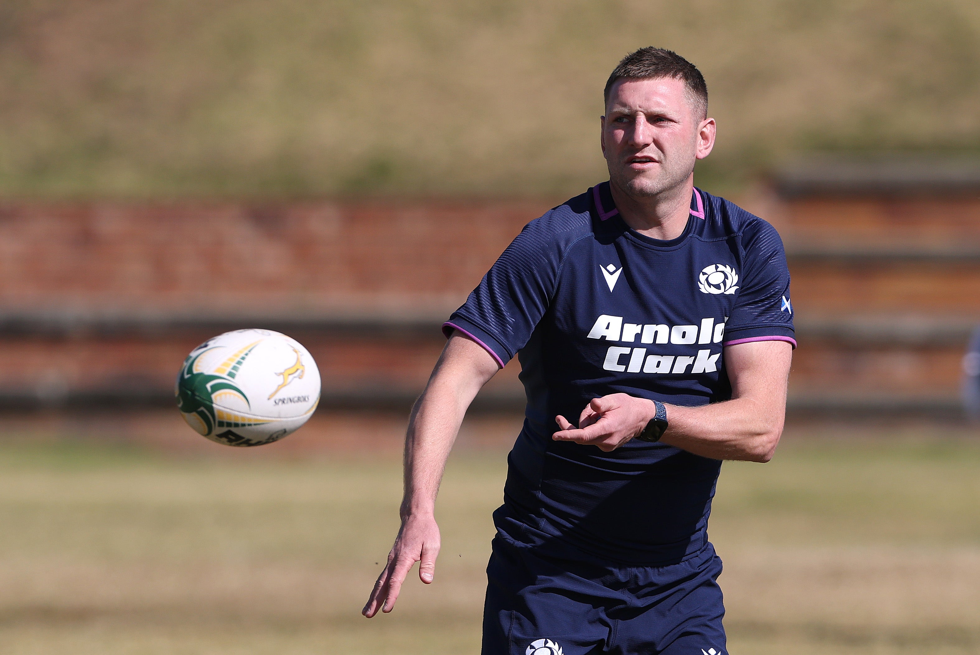 Finn Russell passes the ball during the Scotland Captain's run (Getty)