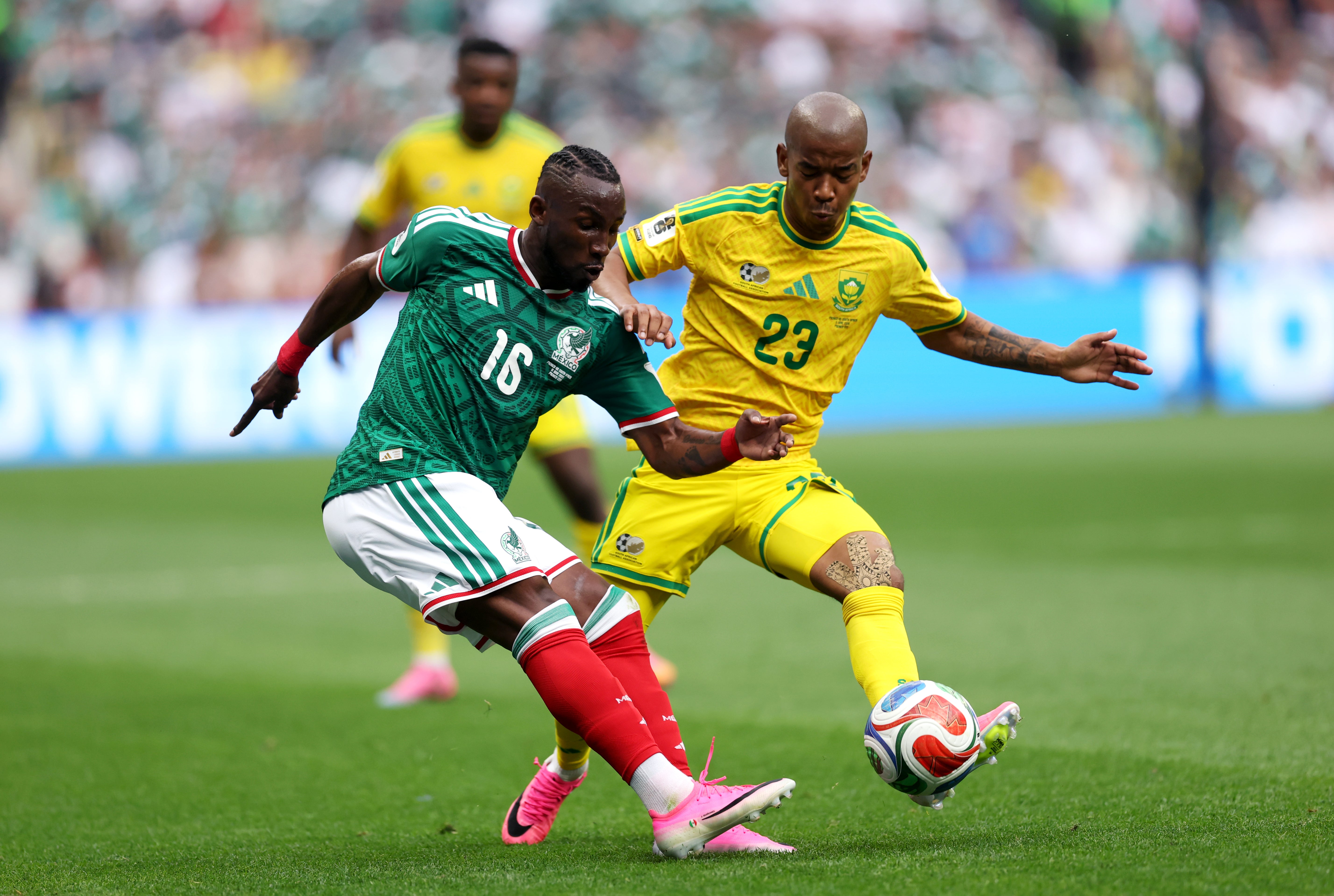 Julian Quinones of Mexico is challenged by Jayden Adams of South Africa (Getty)