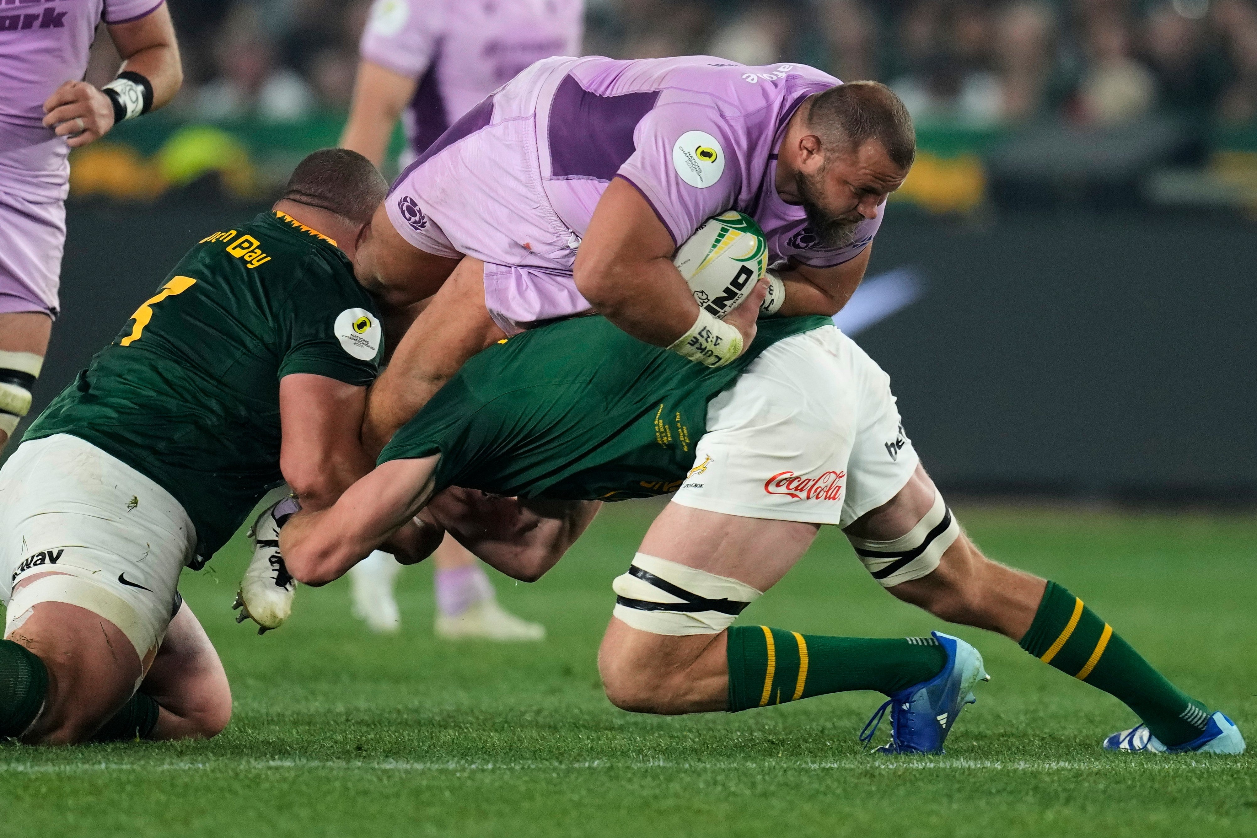 Pierre Schoeman is tackled by Springboks captain Pieter-Steph du Toit (Themba Hadebe/AP)