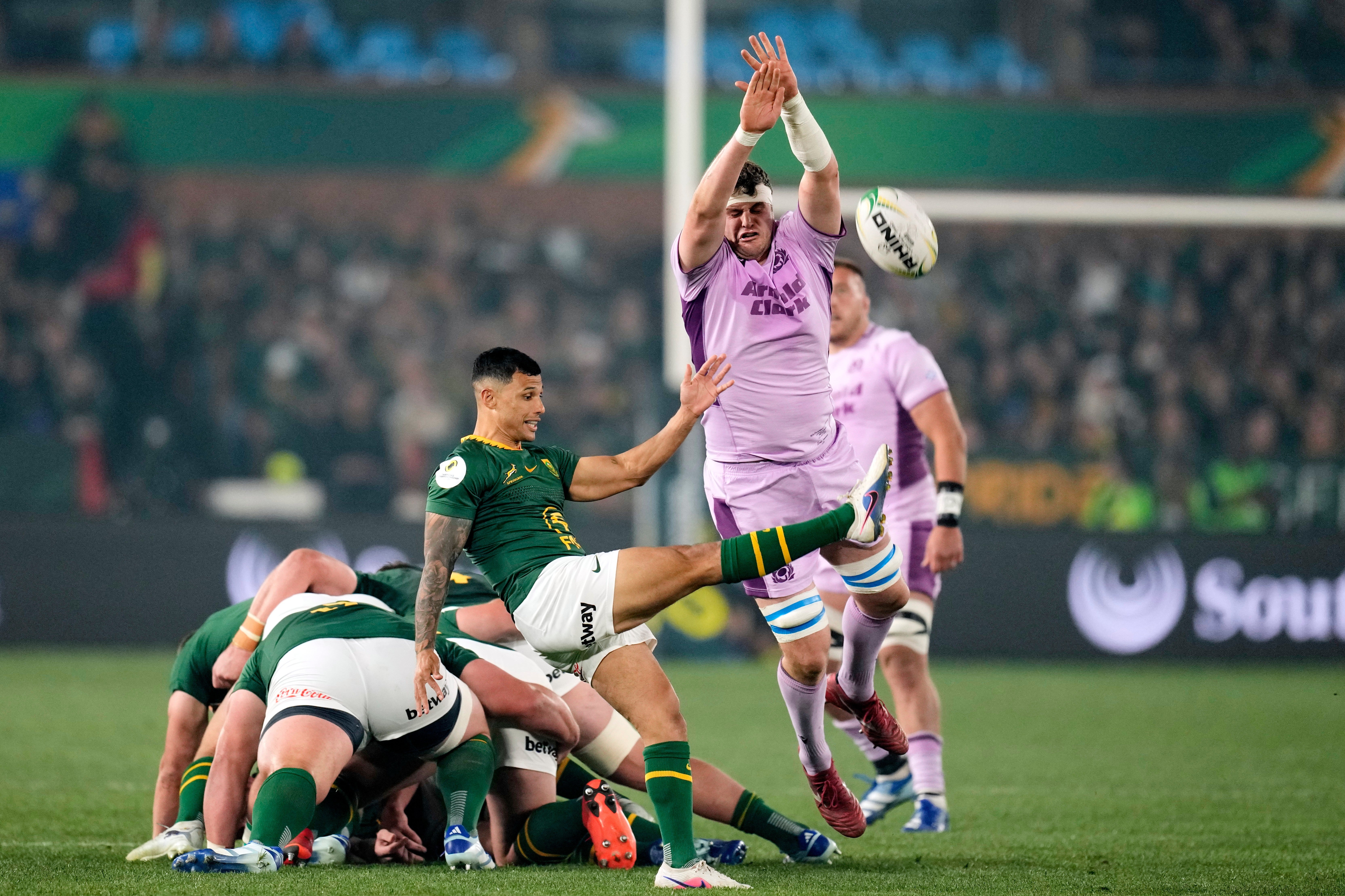 Embrose Papier, centre, scored the opening try for the Springboks (Themba Hadebe/AP)