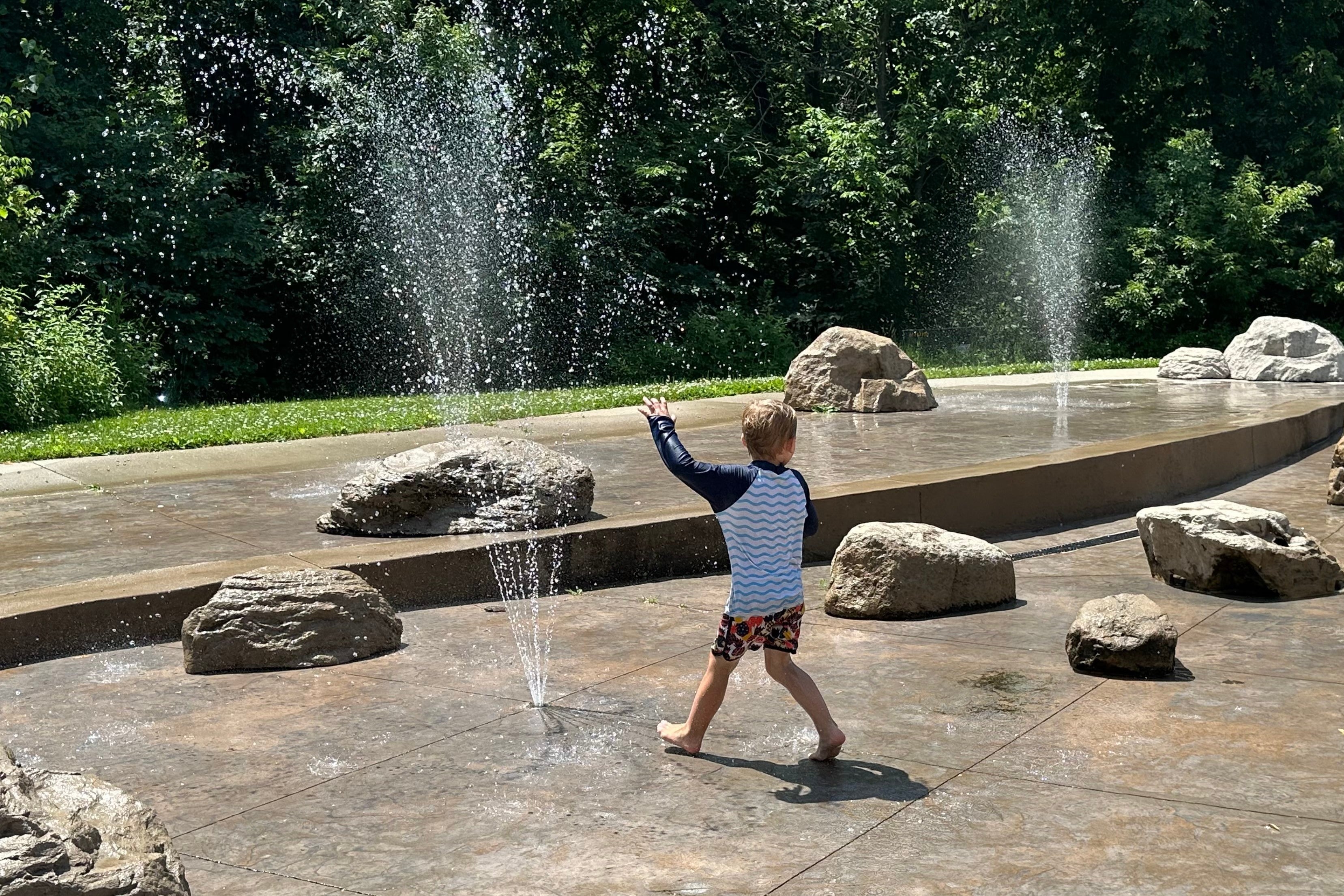 A child plays in a fountain in Des Moines, Iowa. Iowa was ranked 7th on CNBC’s 2026 list of cheapest overall states in the U.S.