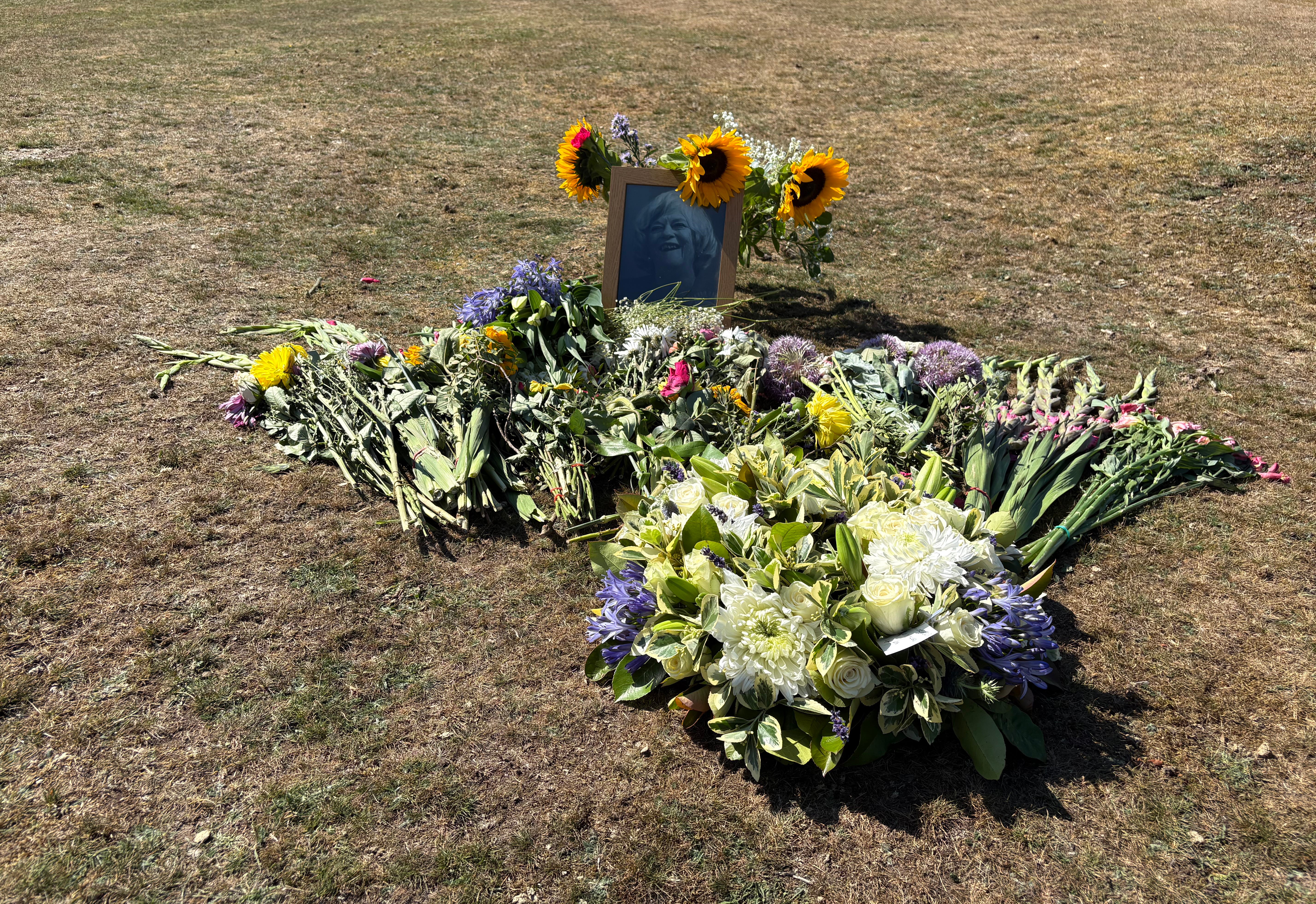 Floral tributes including a wreath laid by Reform UK leader Nigel Farage near to the home of Ann Widdecombe in Haytor in Dartmoor