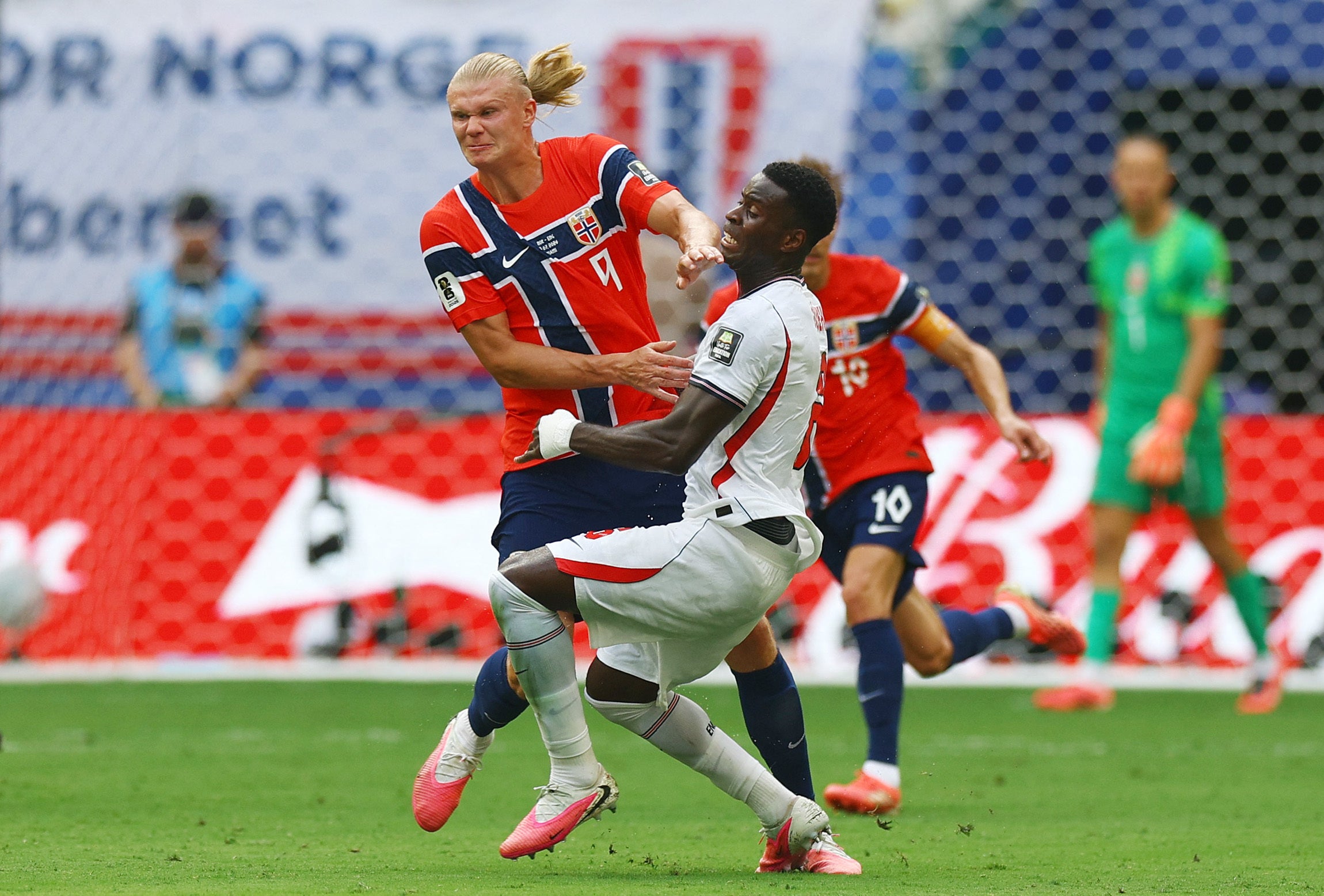 Guehi and Stones had their hands full from kick-off as Erling Haaland threatened