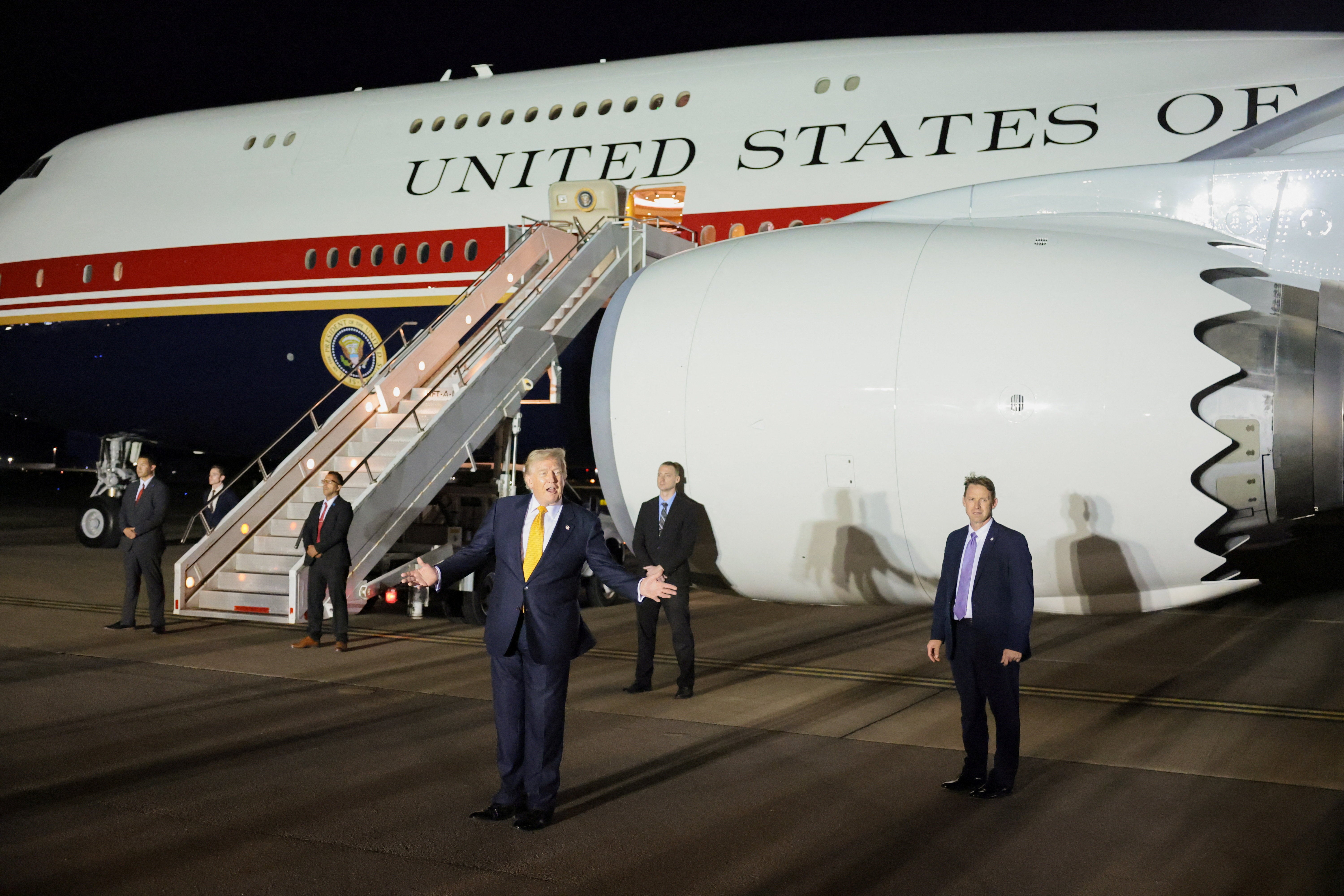 U.S. President Donald Trump shows off his new Qatari-donated Air Force One. He was reportedly forced to switch back to the previous Air Force One on a trip back from a NATO summit in Turkey after Secret Service members voiced their concerns over the plane's defensive capabilities (Reuters)