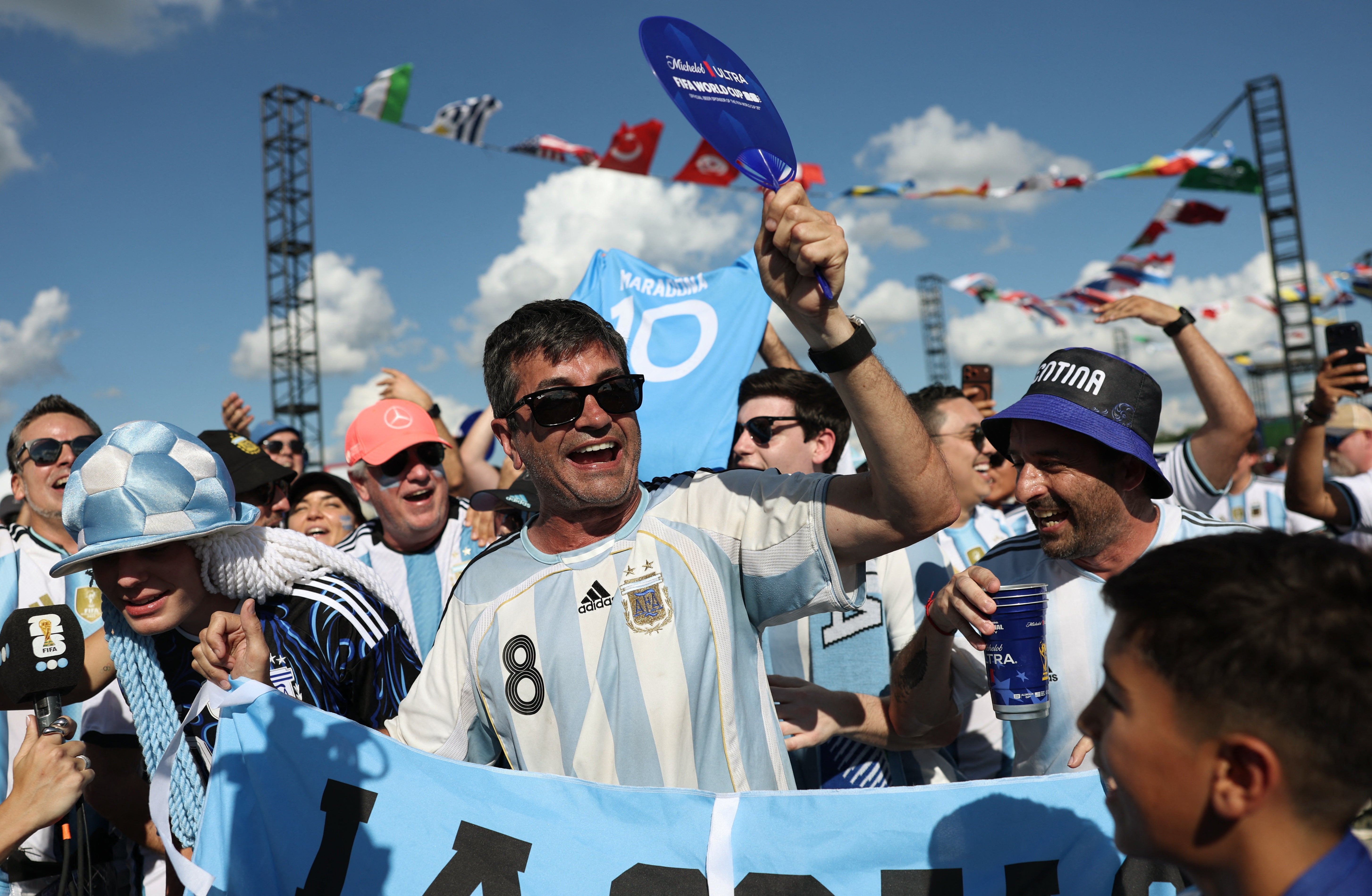 Argentina fans outside the stadium before the match (Reuters)
