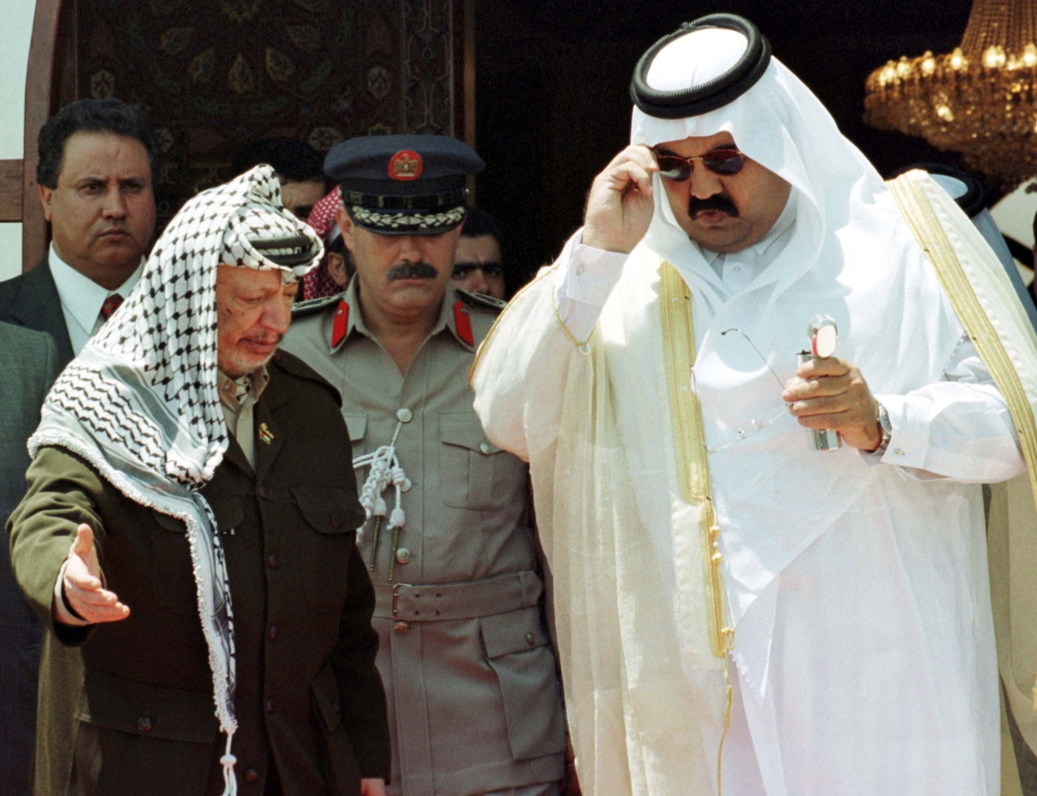 Palestinian president Yasser Arafat receives Sheikh Hamad bin Khalifa al-Thani during the first visit of a Gulf Arab head of state to Gaza on 8 August 1999