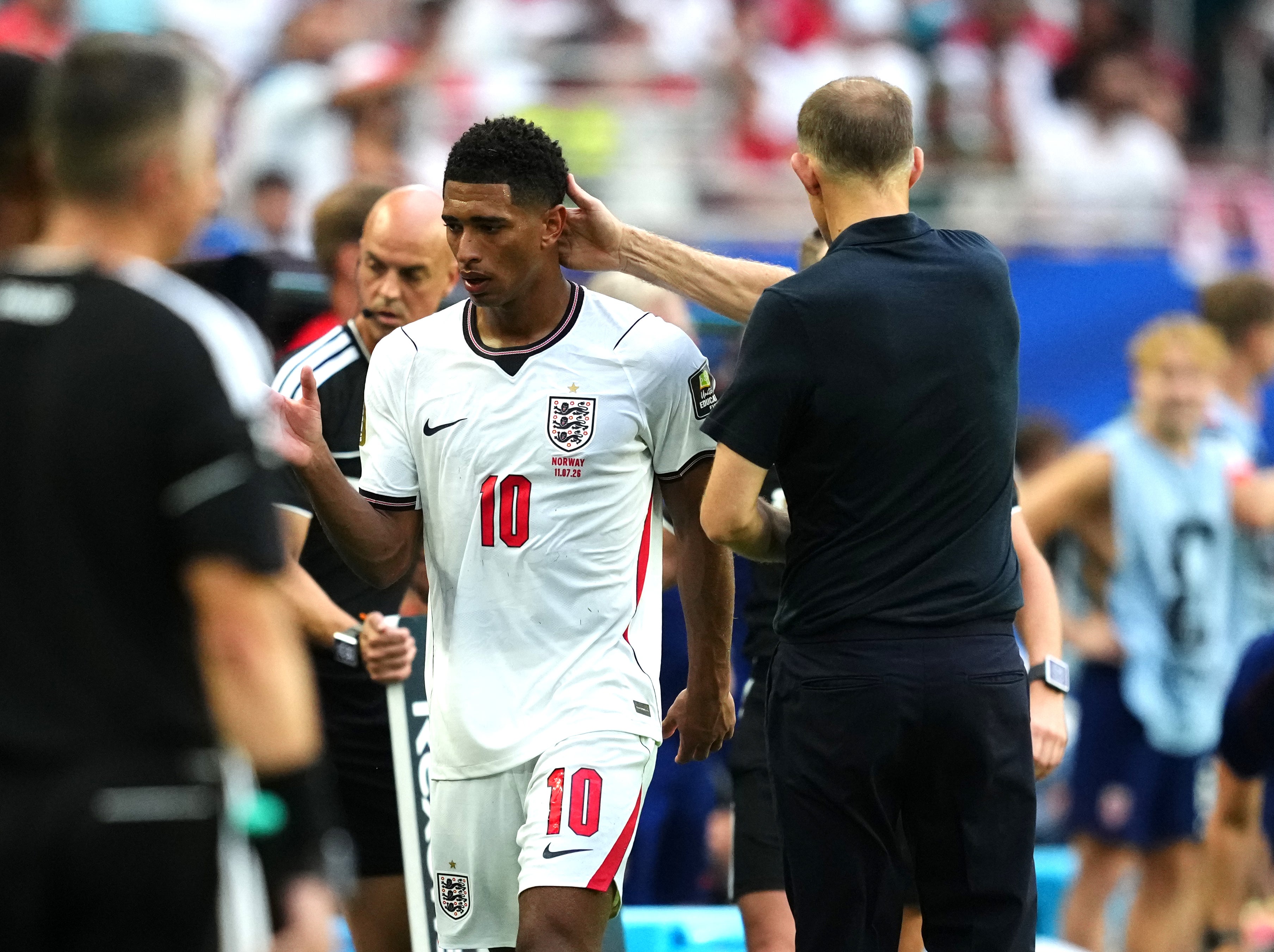 England’s Jude Bellingham greets manager Thomas Tuchel as he is substituted off (Martin Rickett/PA)