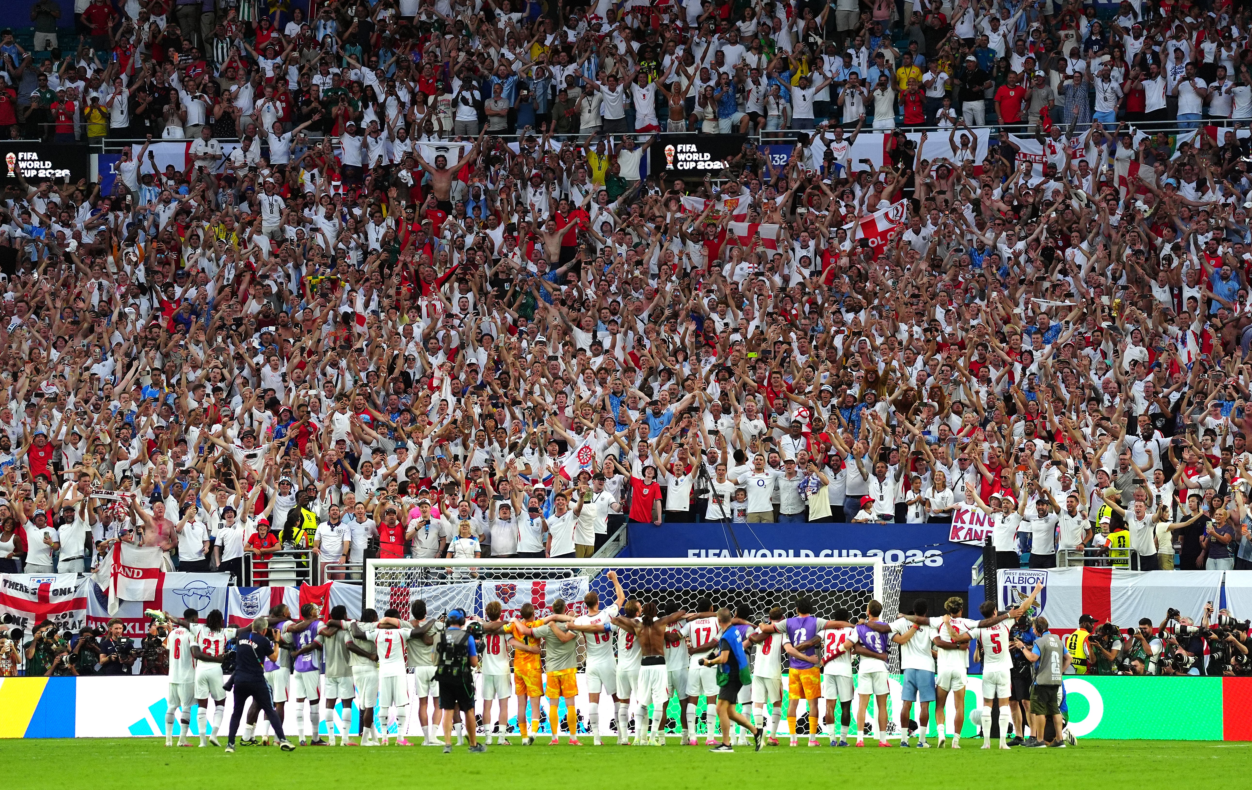England players lined up at gunpoint as England fans sang and celebrated after victory on Saturday