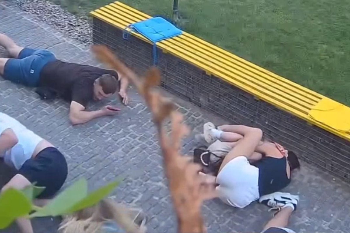 CCTV shows Ukrainian coffee shop customers ducking for cover during Russian airstrike