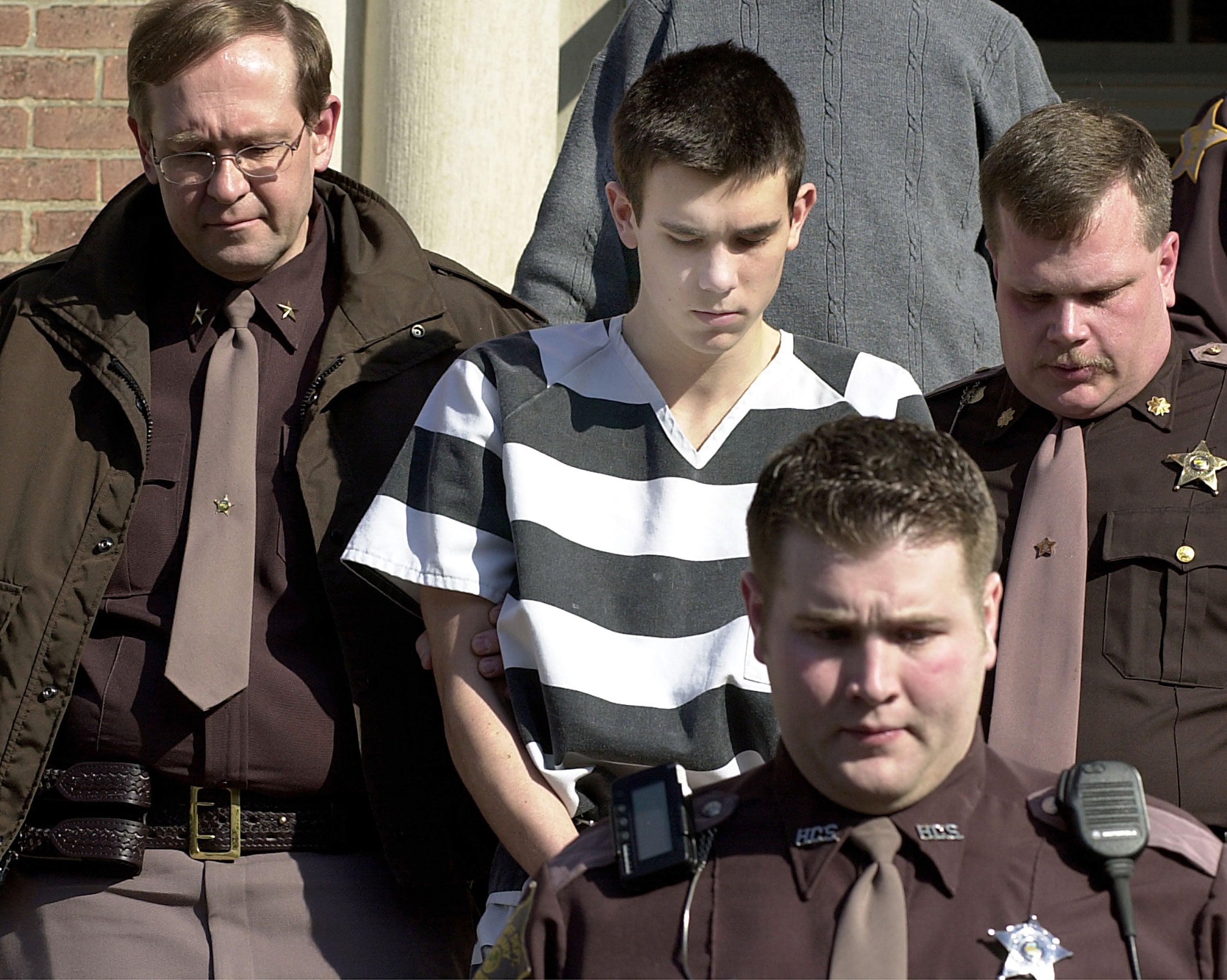 James Parker is led February 20, 2001 to the Henry County Courthouse in New Castle, Indiana. Parker, a 16 year old from New Hampshire is held in custody with another suspect in connection with the slayings of Dartmouth professors Half and Susanne Zantop