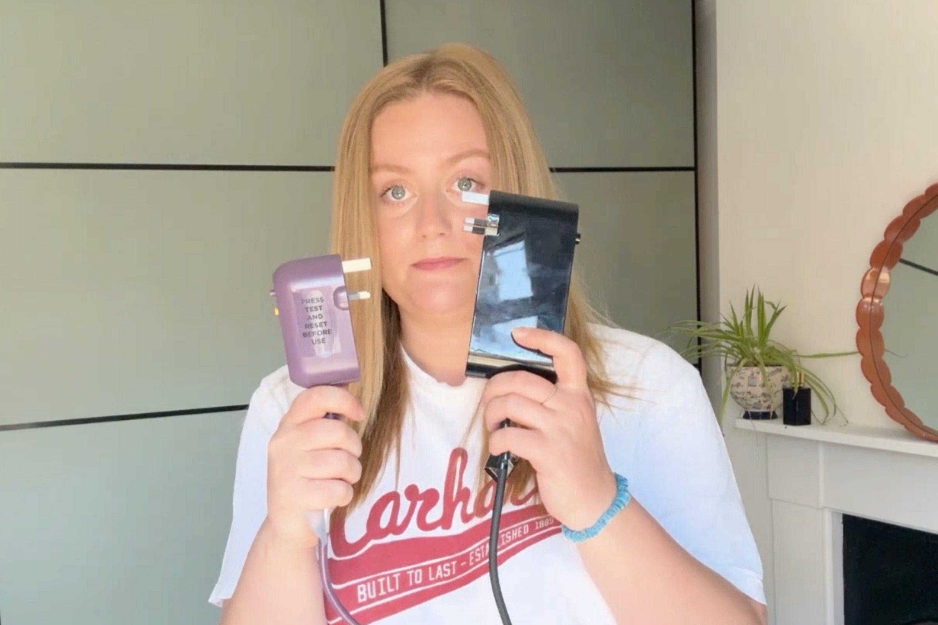The Shark silkipro plug (left) vs the Dyson airstrait plug (right) (Lucy Smith/The Independent)
