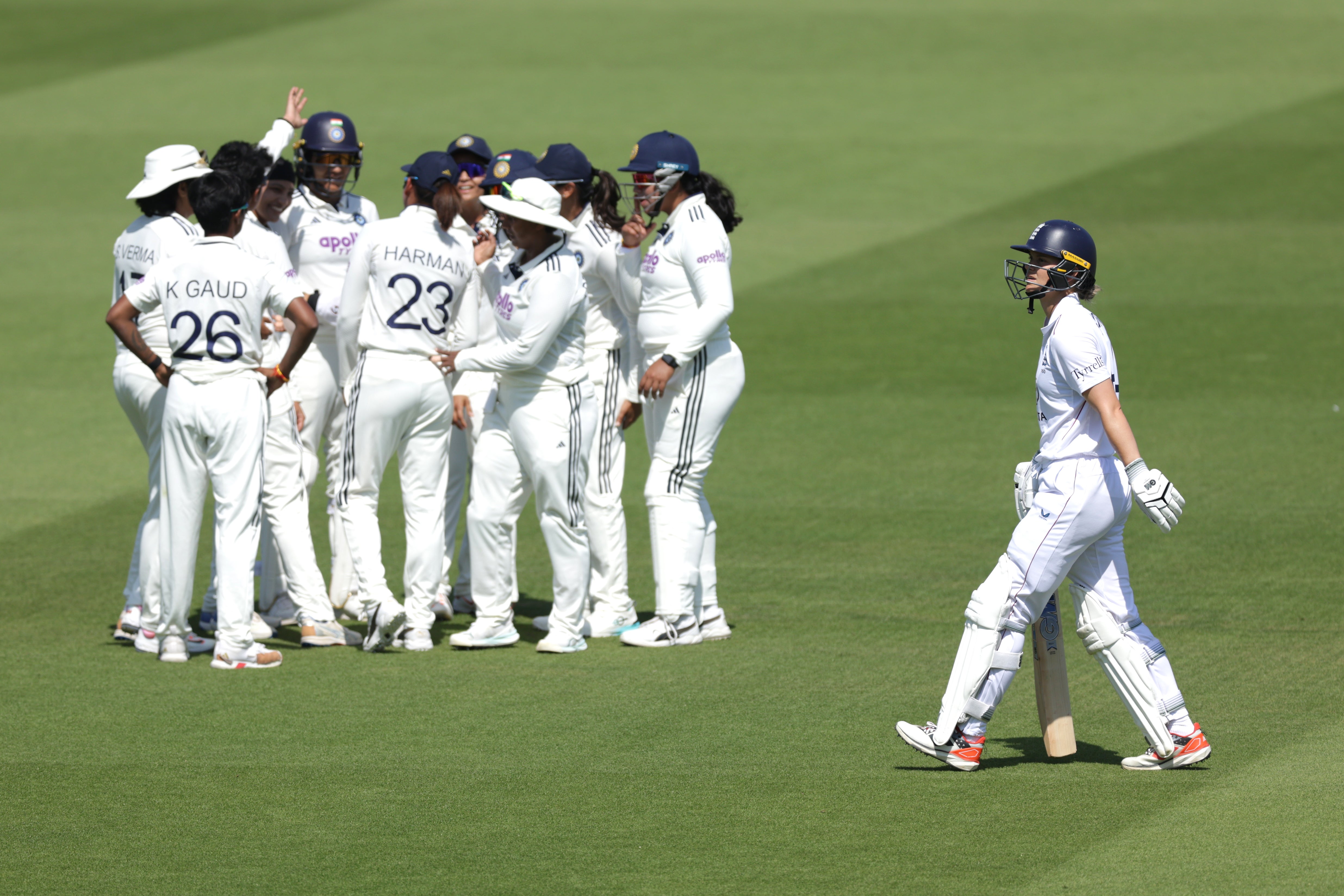 Amy Jones, right, leaves the pitch as India players celebrate her dismissal for 54 (Steven Paston/PA) (PA Wire)