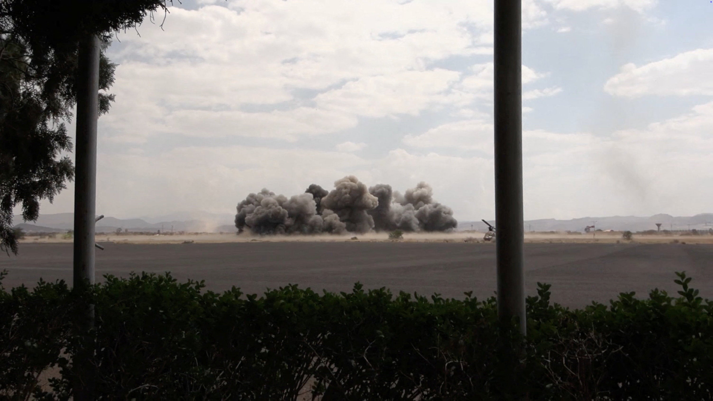 Smoke rises following an airstrike at Sanaa International Airport, in Sanaa, Yemen (Reuters)