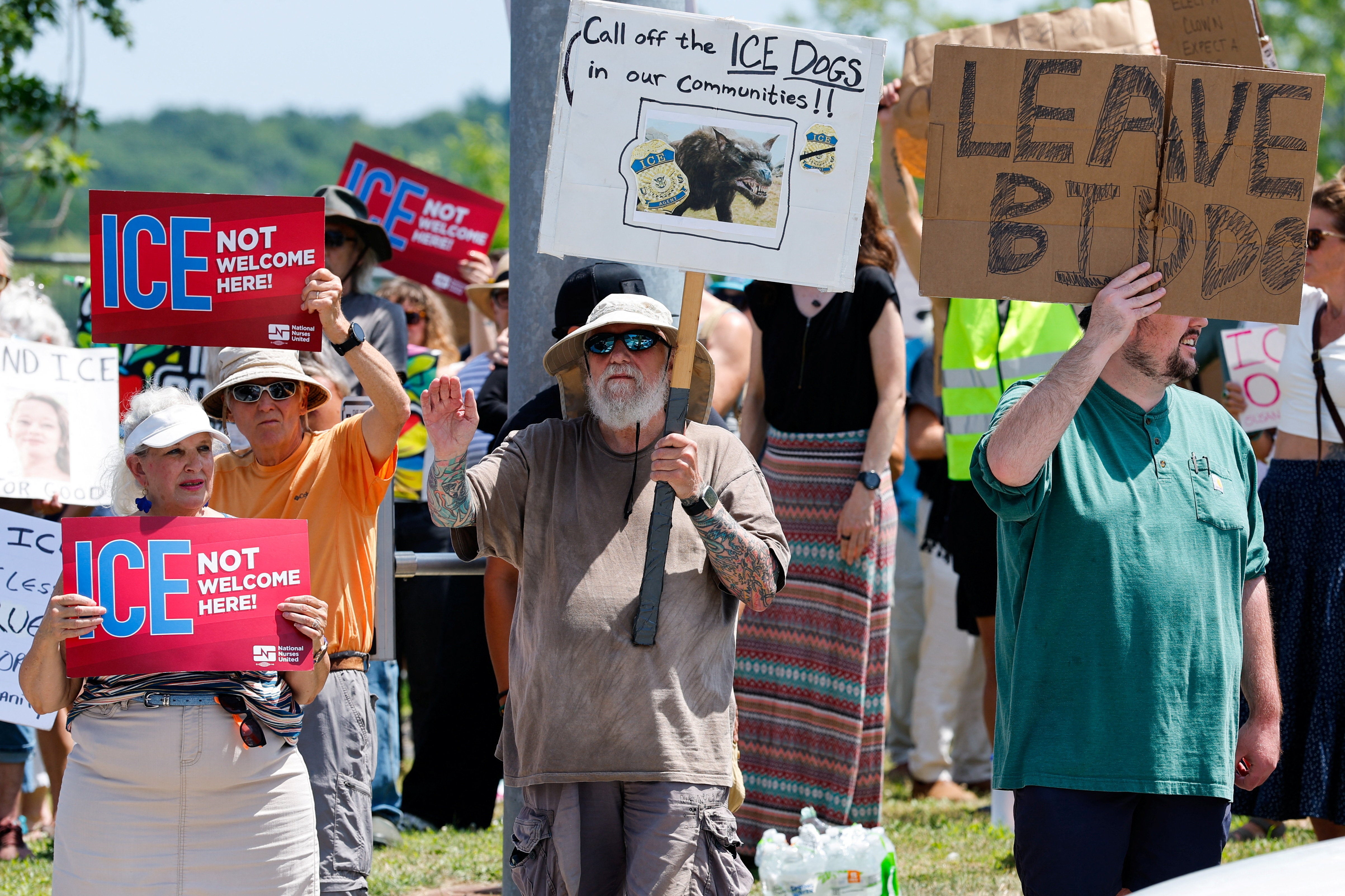 Protesters surrounded the scene of the shooting in Biddeford, roughly 15 miles south of Portland, as state and state and federal law enforcement descend on the city (Reuters)