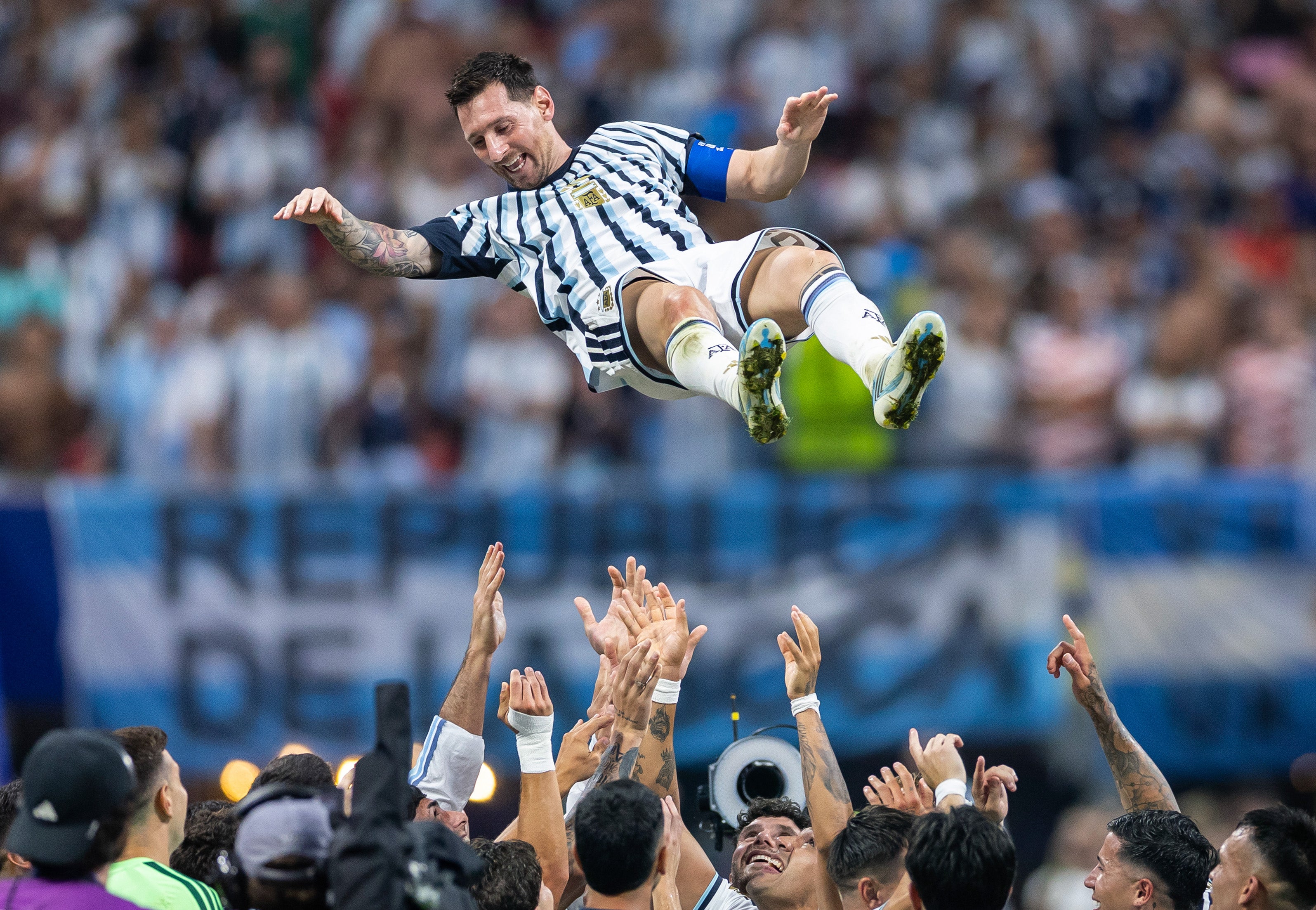 Lionel Messi #10 of Argentina is thrown in the air by teammates after the 3-2 victory during the FIFA World Cup 2026 Round of 16 match between Argentina and Egypt