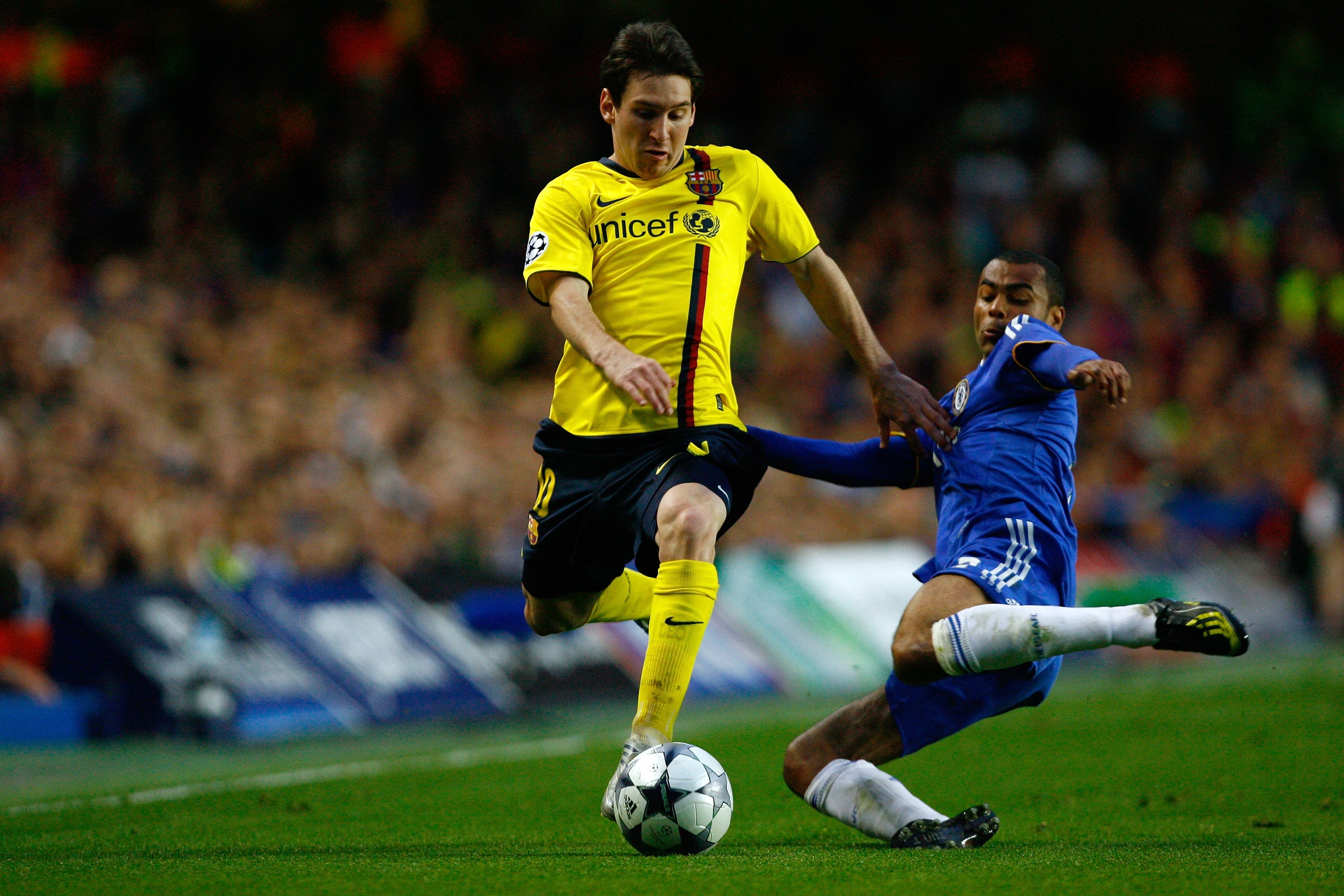 Ashley Cole (right) was one of few to get the better of Lionel Messi in their meetings (Getty)