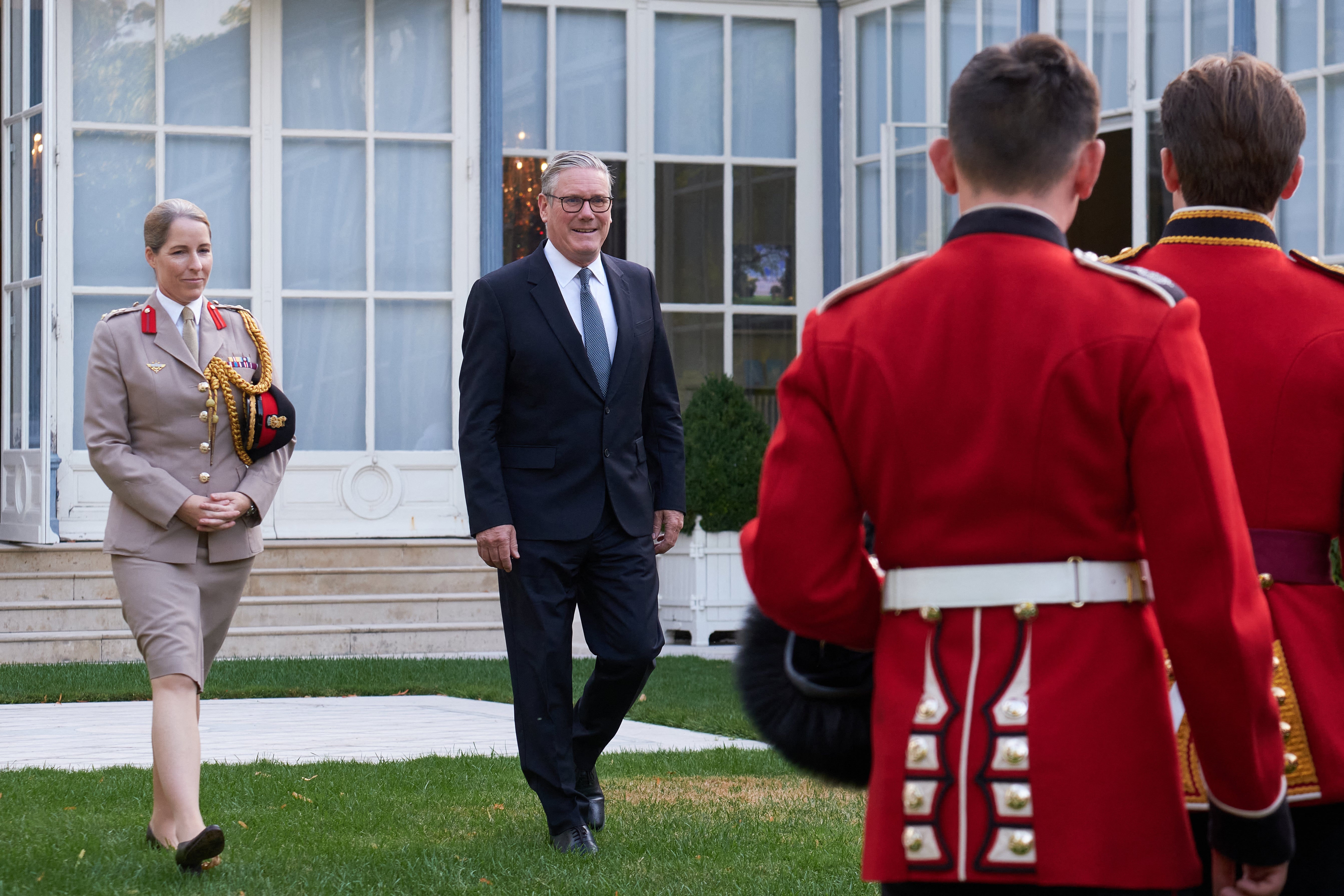 Keir Starmer meets with the British Army's Grenadier Guards at the British Residence ahead of the annual Bastille Day military parade in Paris