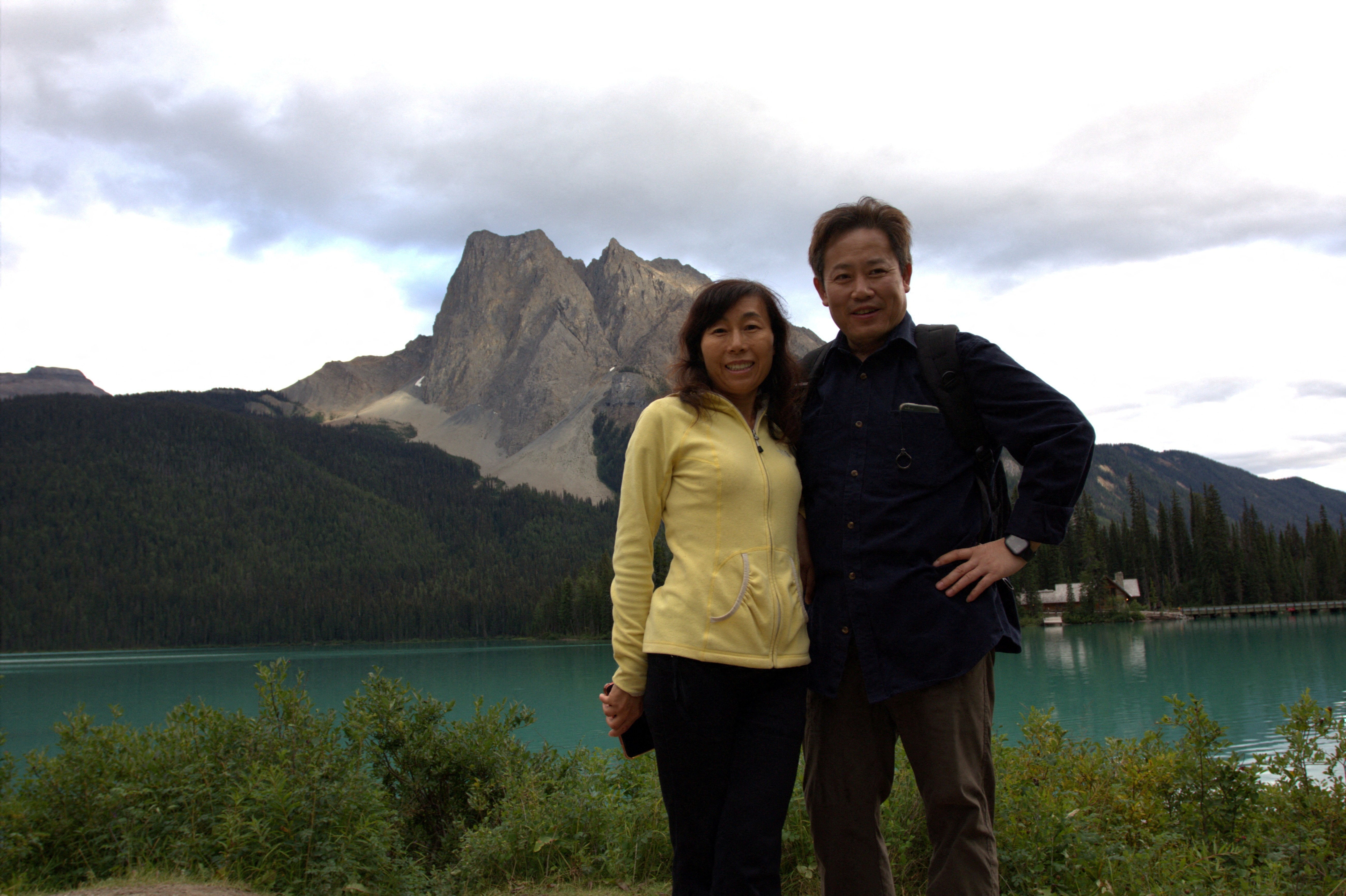 Dr. Yufang Rong and her husband Dr. Youlin Chen, an American seismologist held for nearly two years by China, pose together at Emerald Lake, Yoho National Park, British Columbia, Canada in this undated photograph