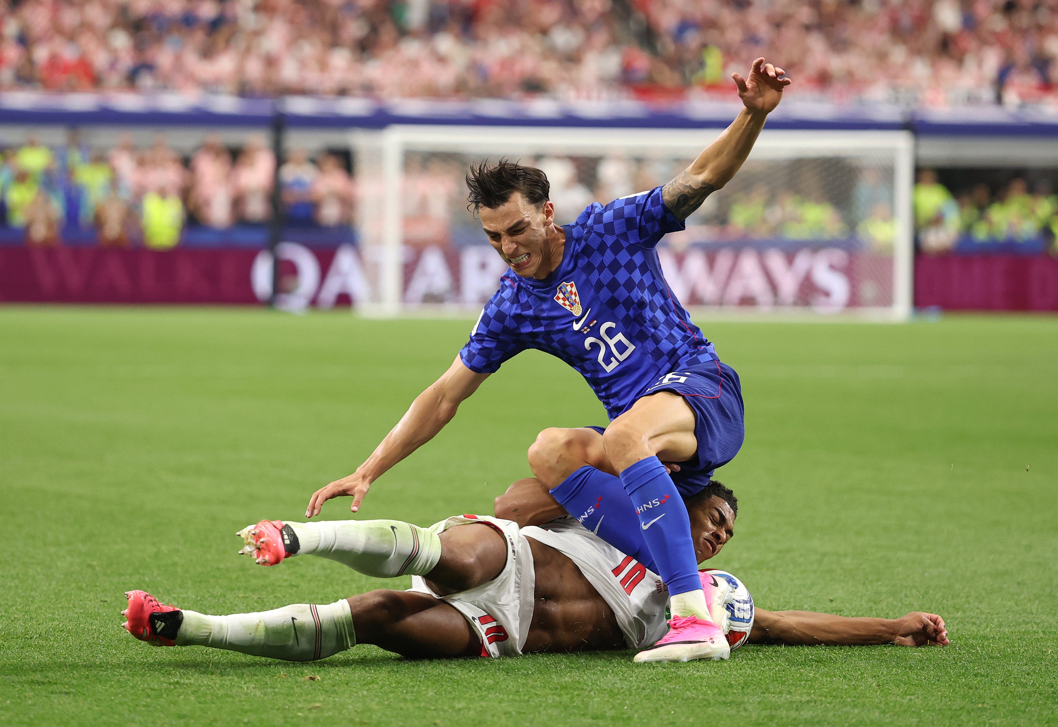 Bellingham slides through Croatia’s Petar Musa