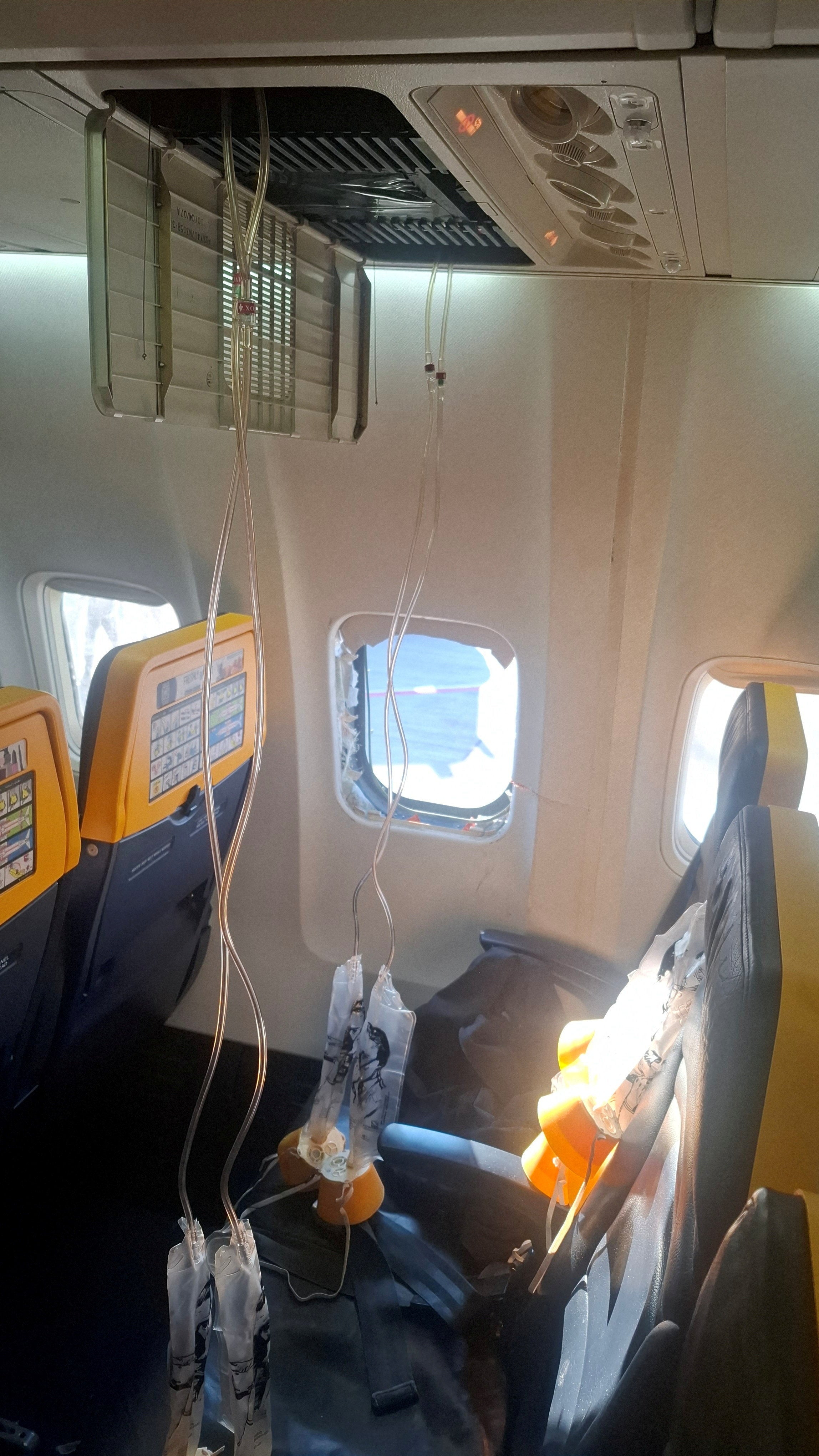 The broken window as seen after the emergency landing on Friday