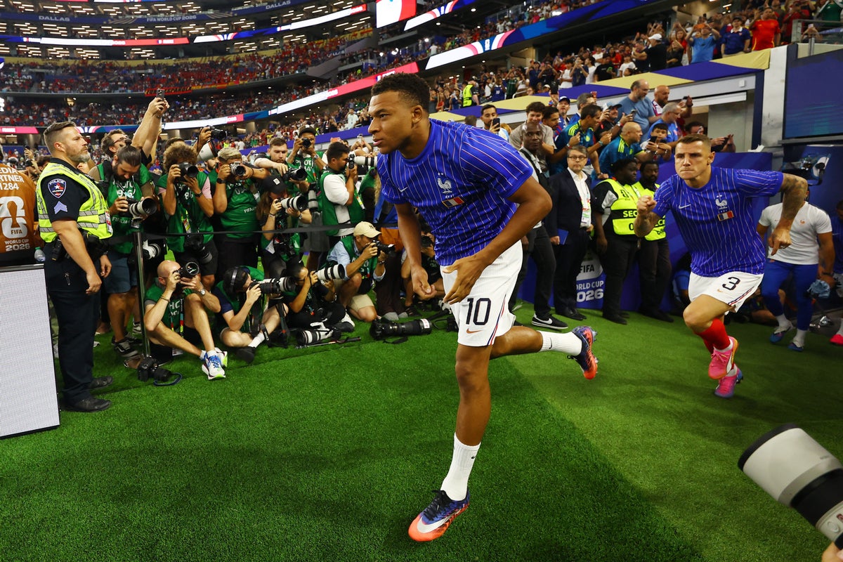 'My back is gone!' Injury fears over Arsenal star William Saliba as he is forced off in agony during France's World Cup semi-final clash with Spain