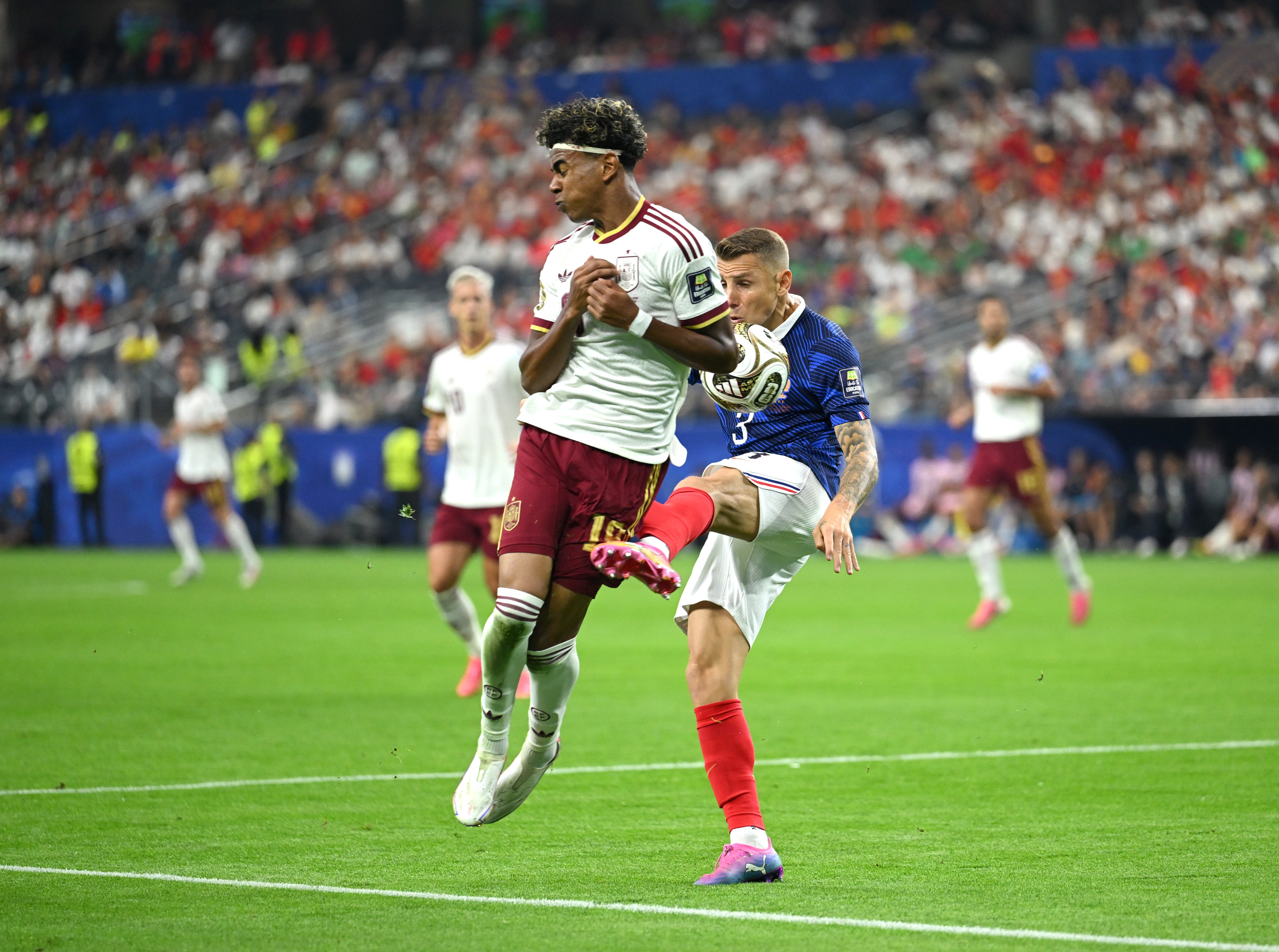 Lamine Yamal #19 of Spain is fouled in the box by Lucas Digne #3 of France (Getty)