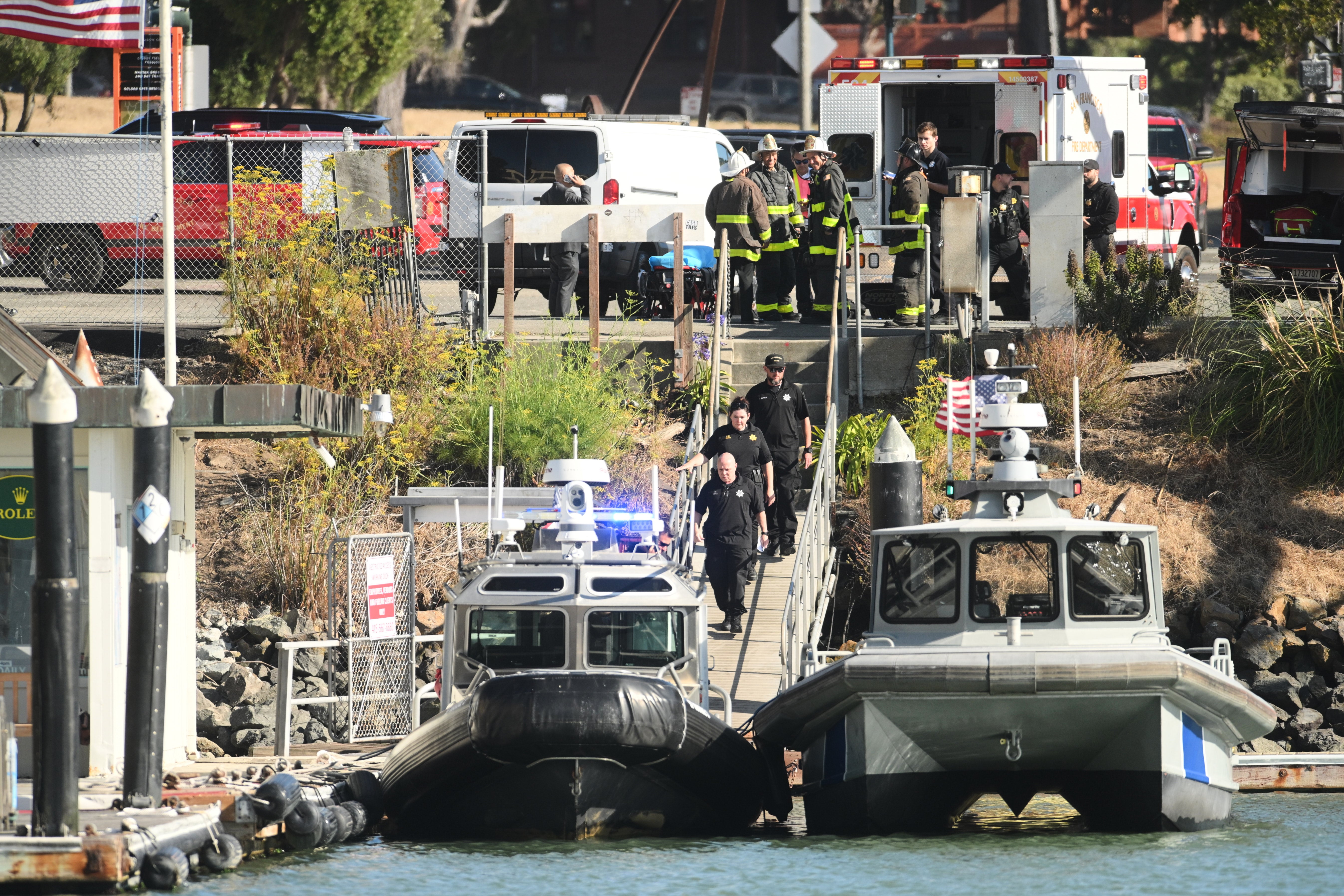 One person is reportedly dead and two others are missing after a pontoon boat carrying 19 people sank near Alcatraz Island in San Francisco Bay on Tuesday