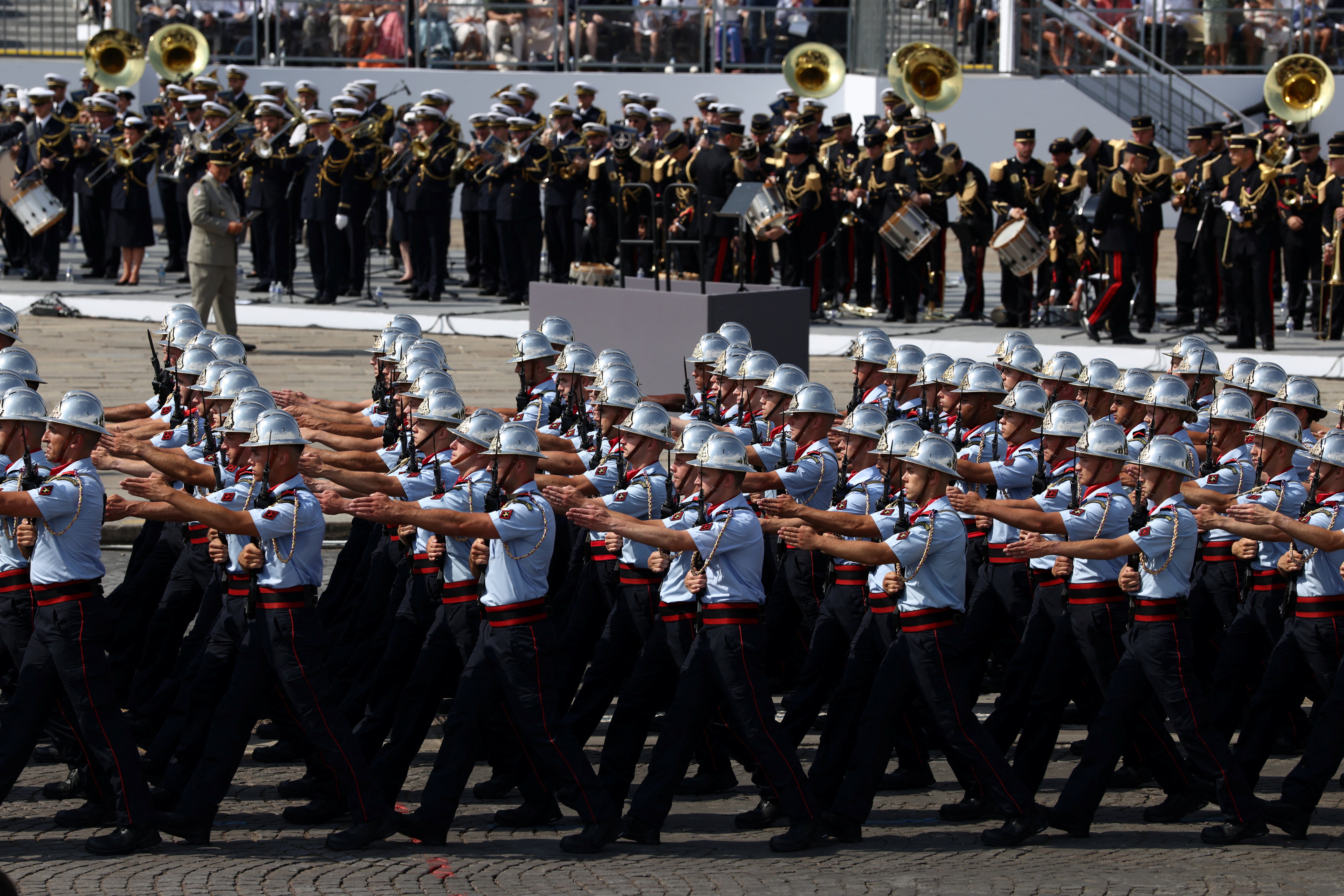 Members of the firefighter brigade of Paris march during the annual Bastille Day military parade on the Place de la Concorde in Pari (Reuters)