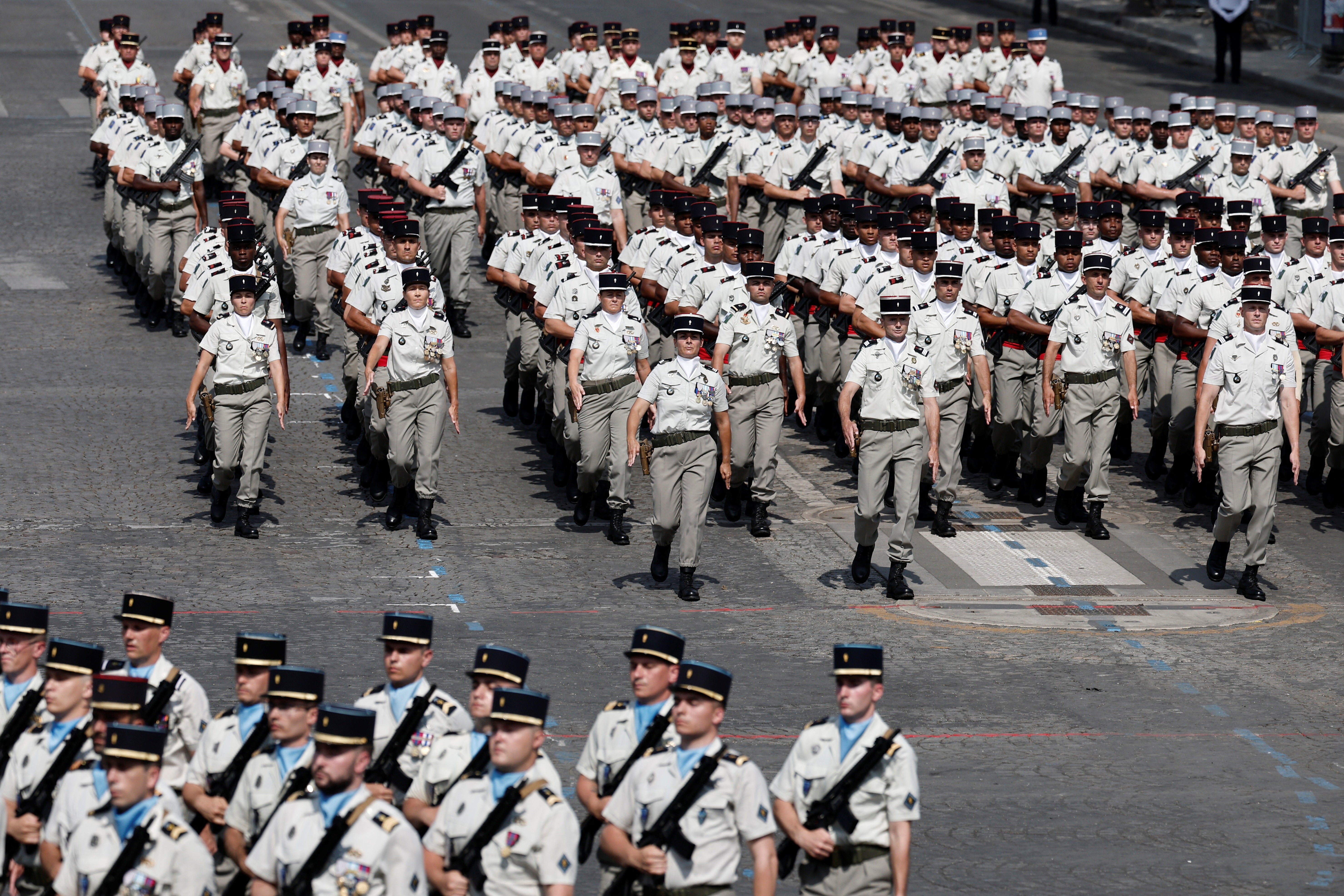 Soldiers from the 503rd Transport Regiment, specializing in force logistics, march during the annual Bastille Day military parade on the Champs-Elysees avenue in Paris (Reuters)