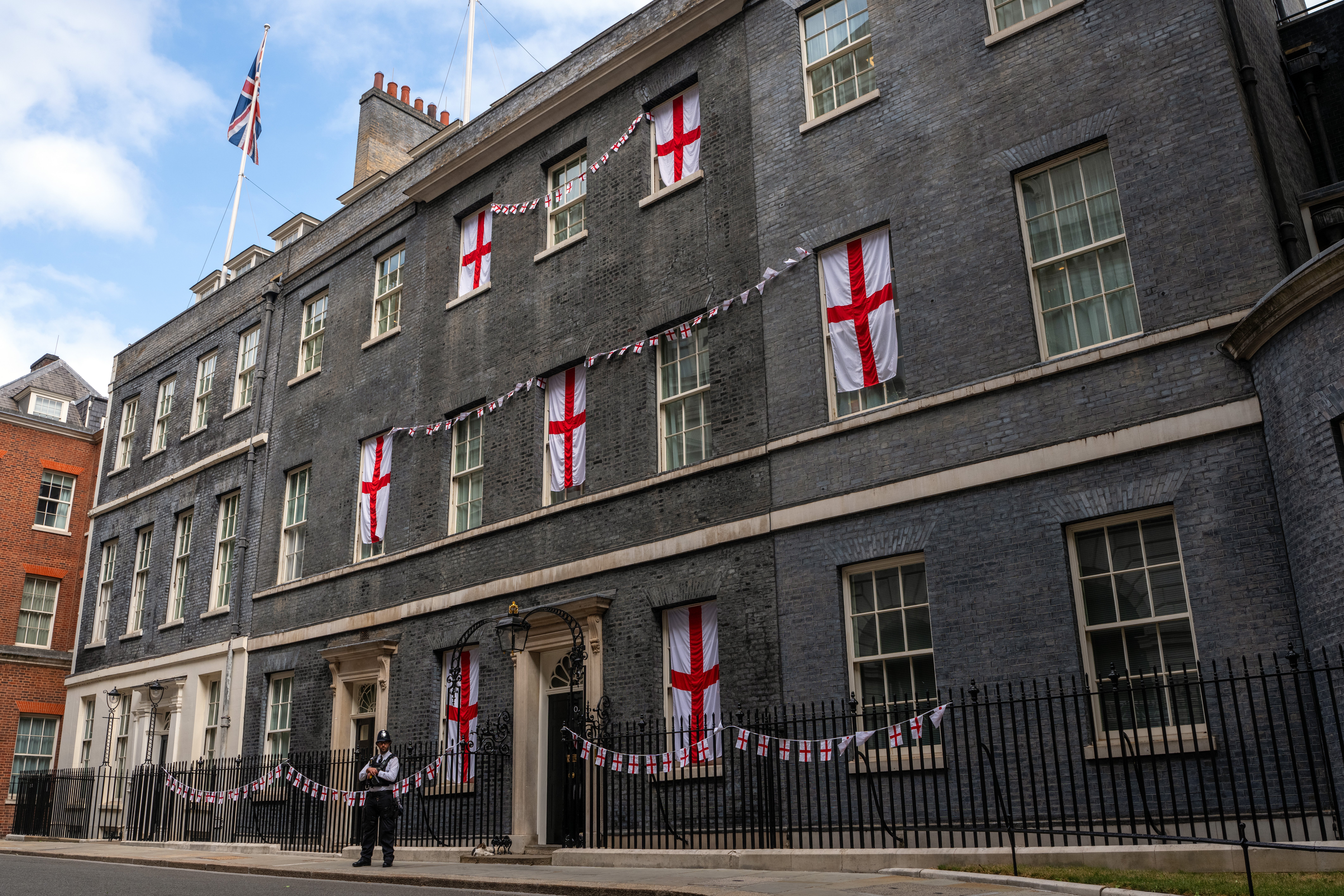 England flags are displayed outside No.10 Downing Street ahead of tonight’s World Cup semi-final match against Argentina (Getty)